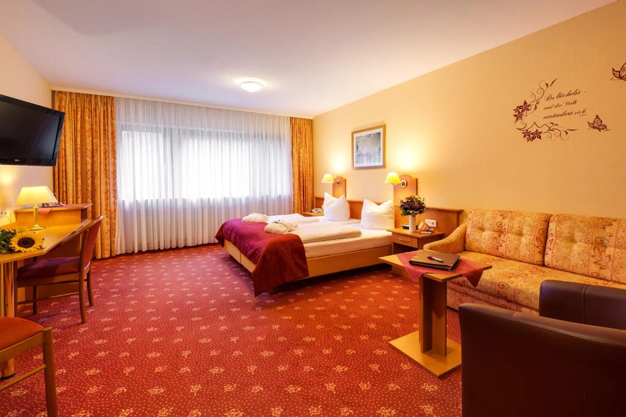 Bed in Hotel Die Kleine Blume