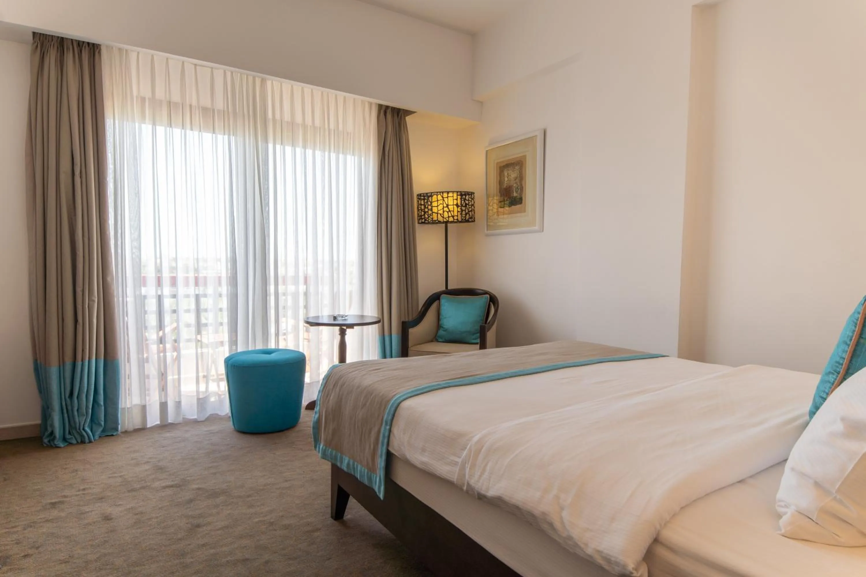 Bed in Arkin Palm Beach Hotel