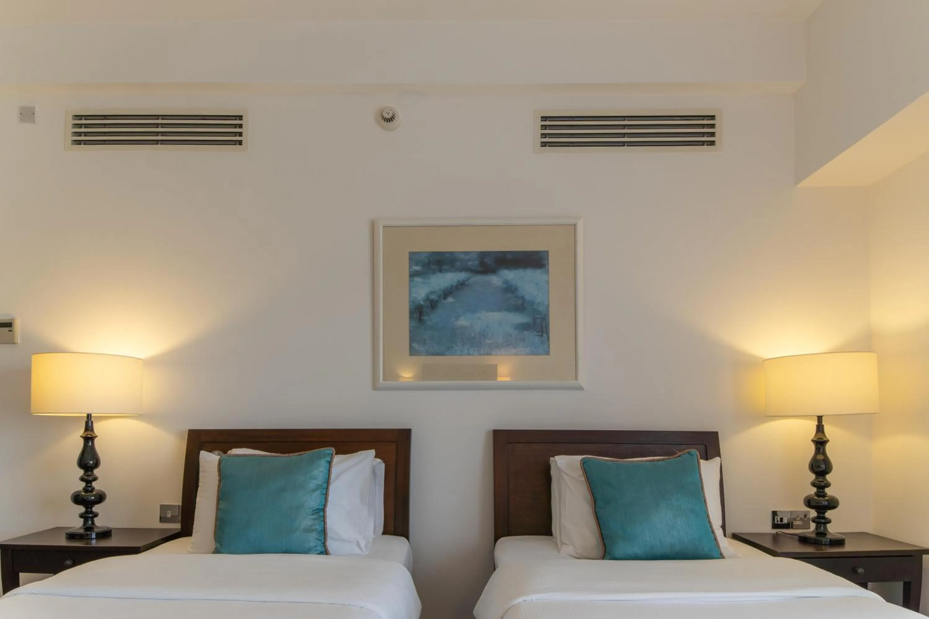 Bed in Arkin Palm Beach Hotel