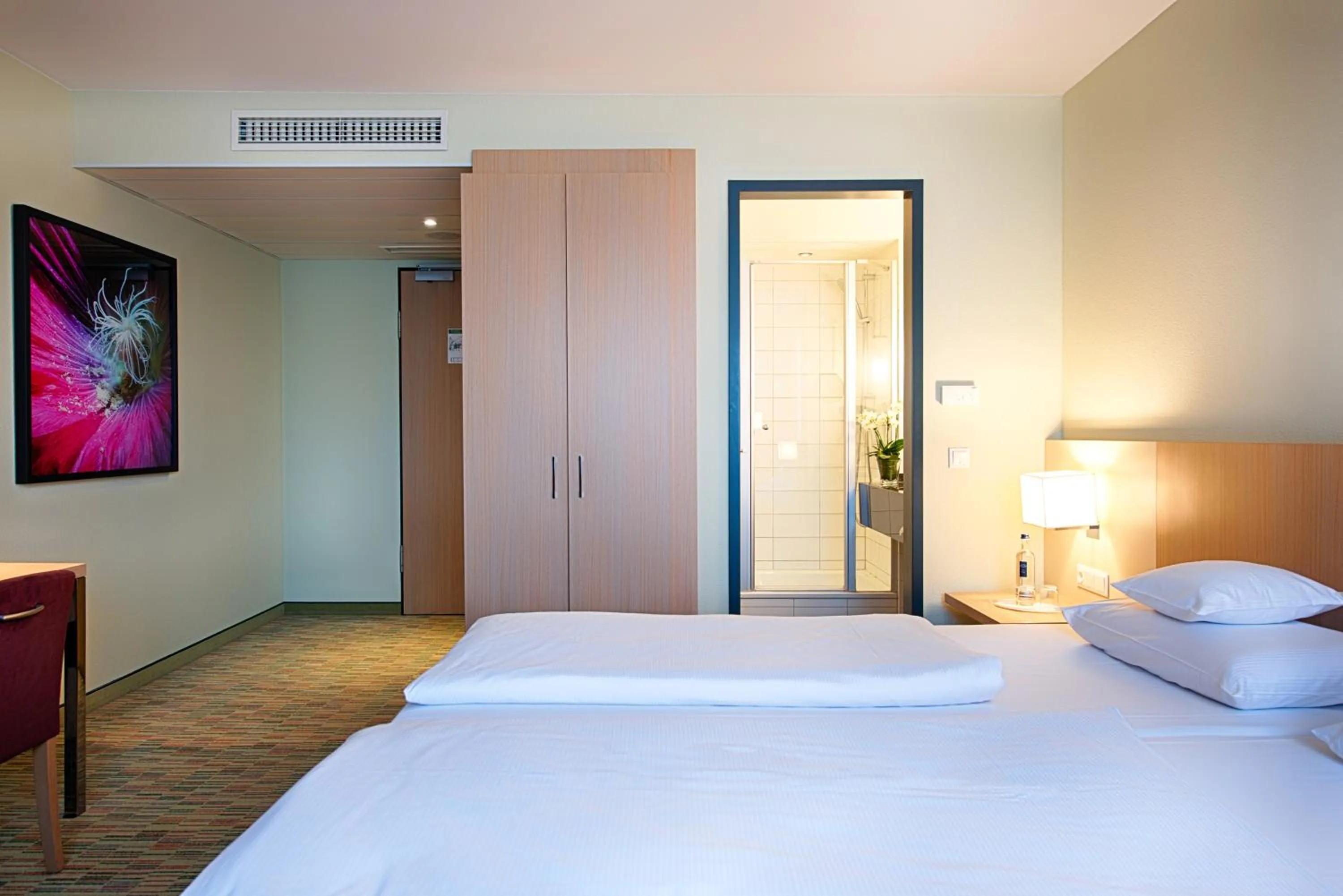 Photo of the whole room, Bed in Welcome Hotel Paderborn