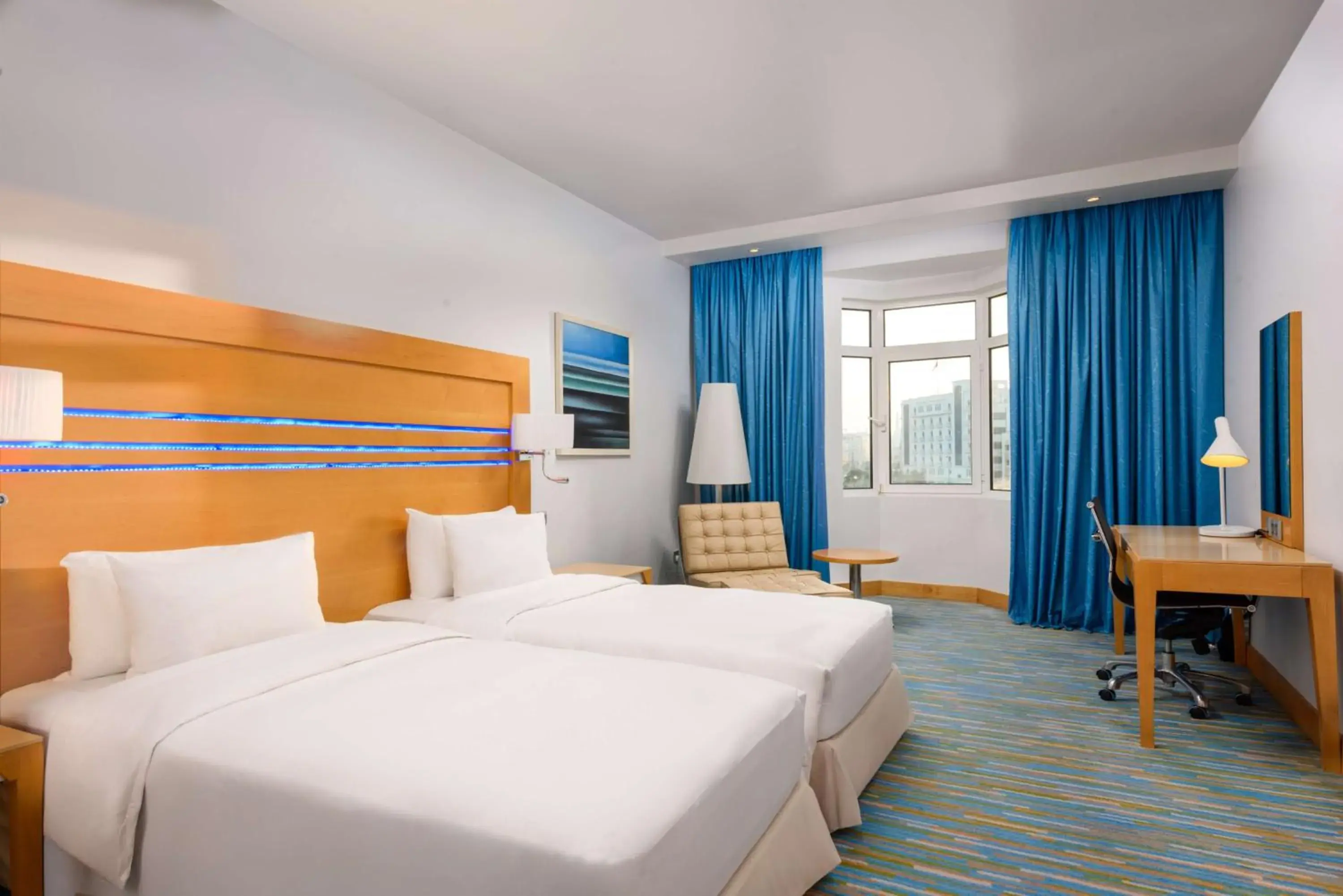 Bedroom, Bed in Radisson Blu Hotel, Muscat Bedroom, Bed in Radisson Blu Hotel, Muscat