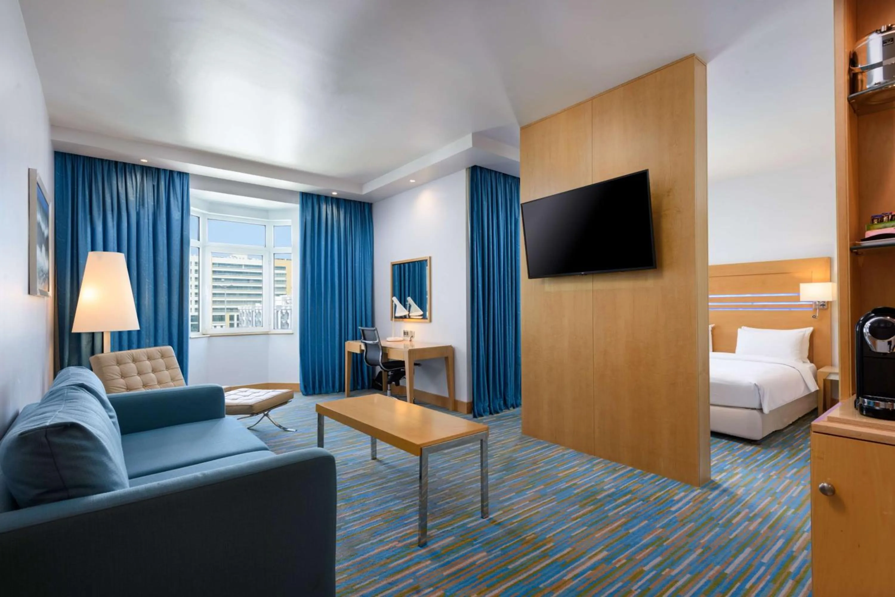 Photo of the whole room, Bed in Radisson Blu Hotel, Muscat