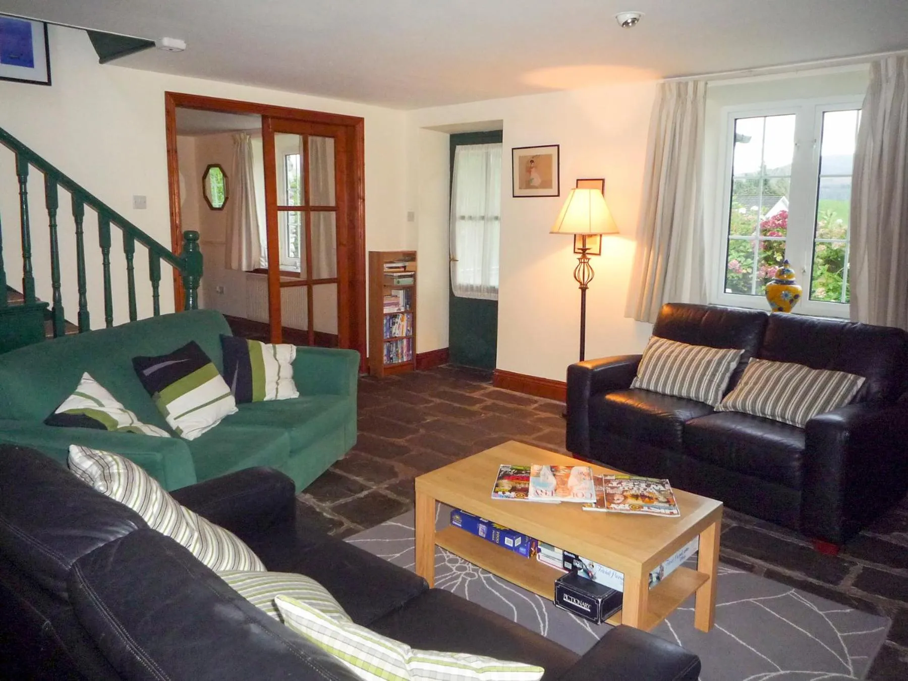 Living room in Stone Cottage Kenmare by Trident Holiday Homes