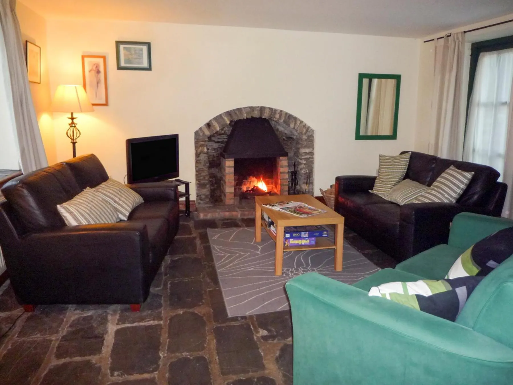 Living room in Stone Cottage Kenmare by Trident Holiday Homes