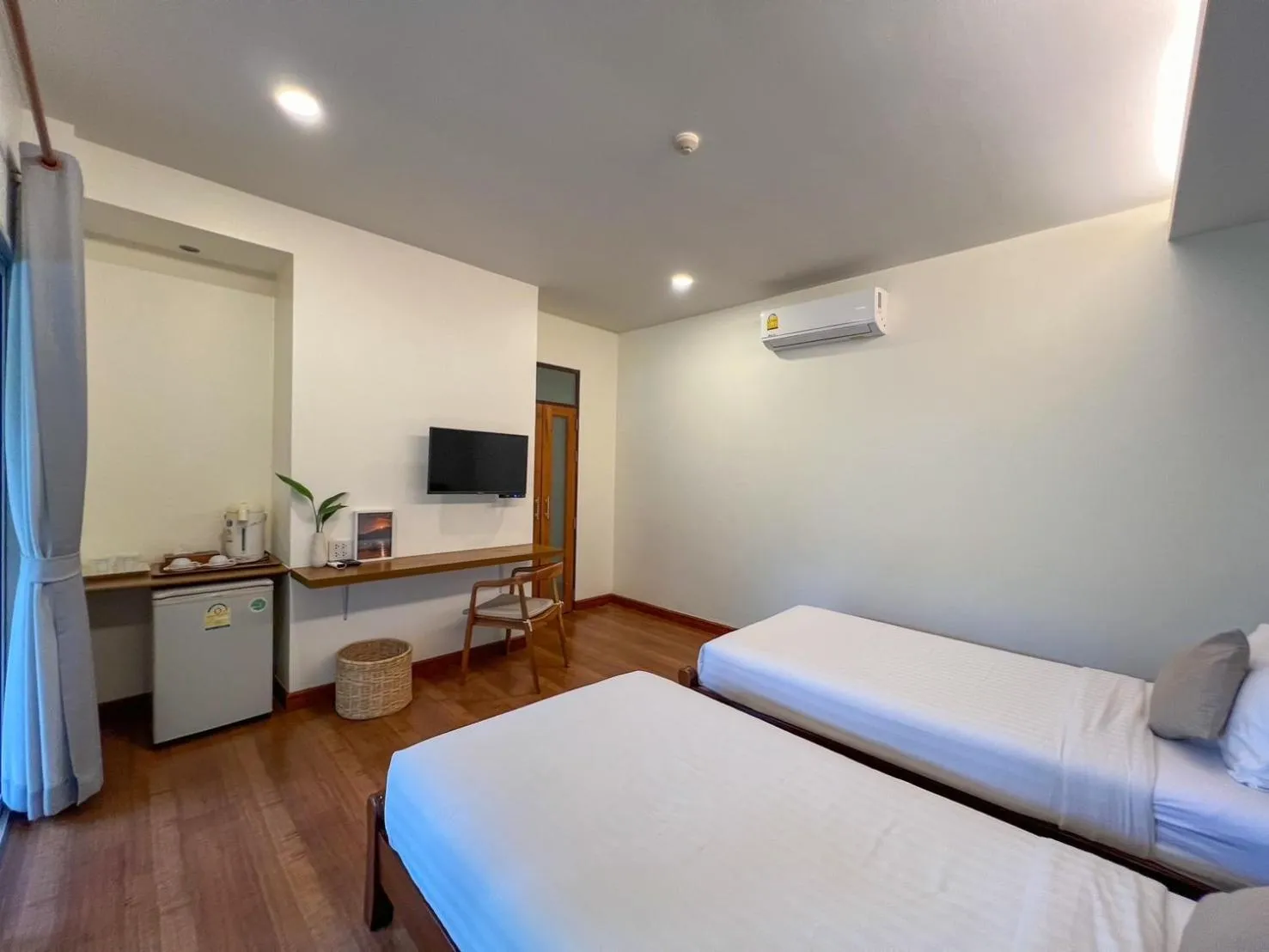 Bed in Nisasiri Boutique Resort