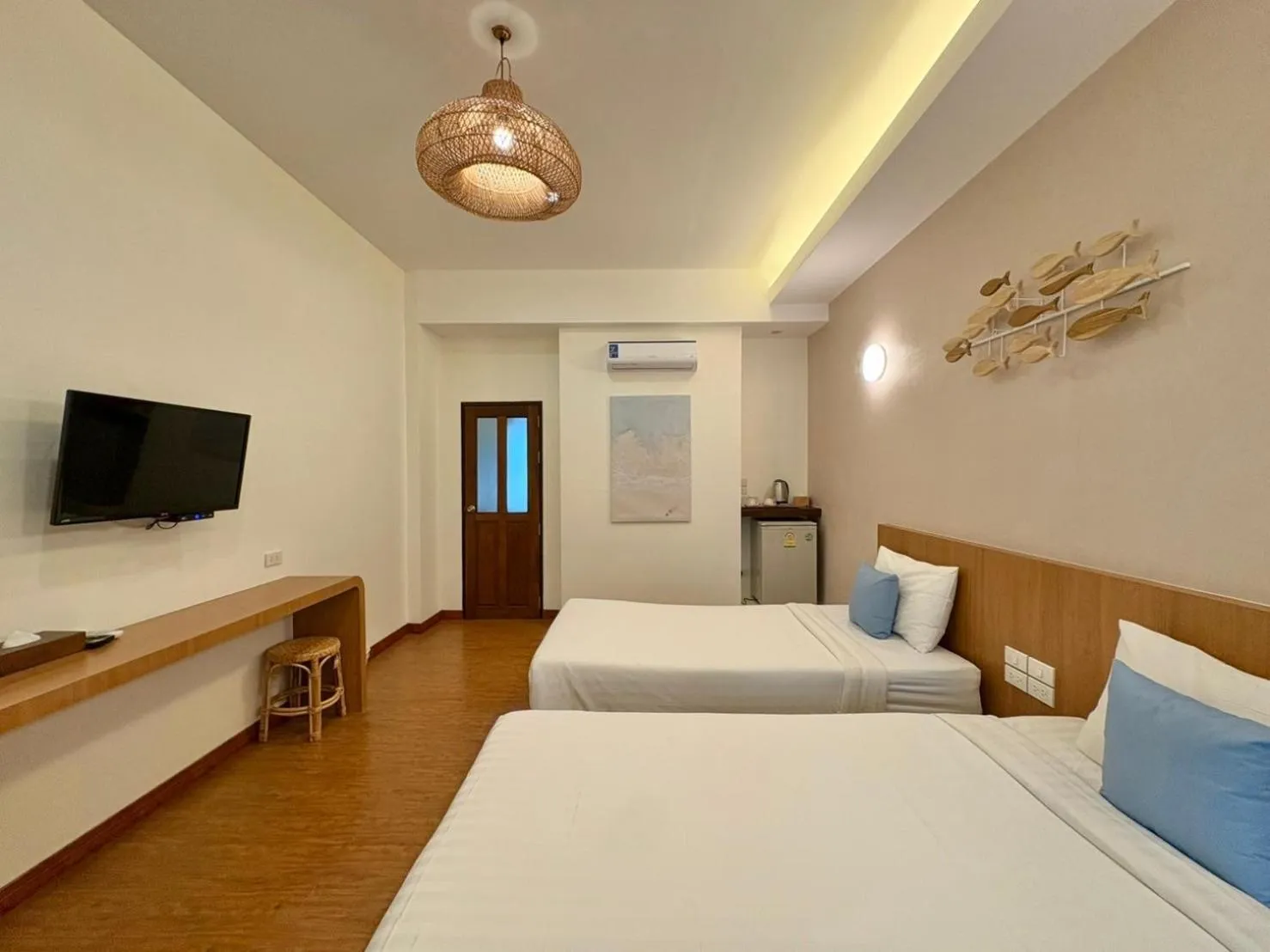 Bed in Nisasiri Boutique Resort