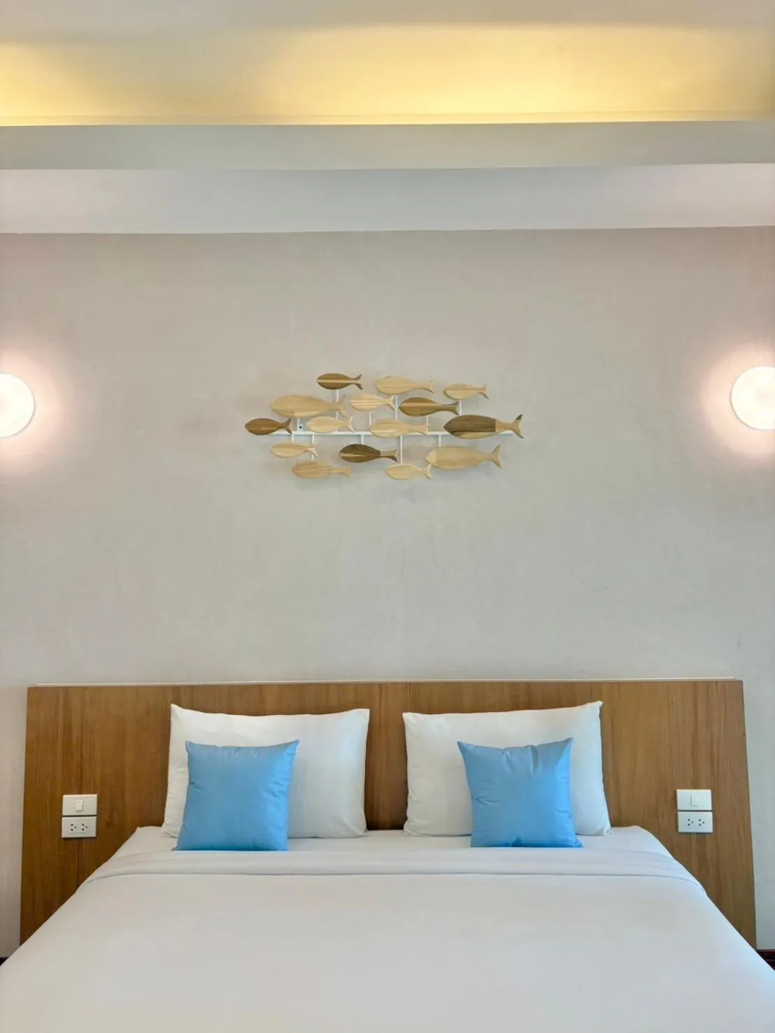 Bed in Nisasiri Boutique Resort