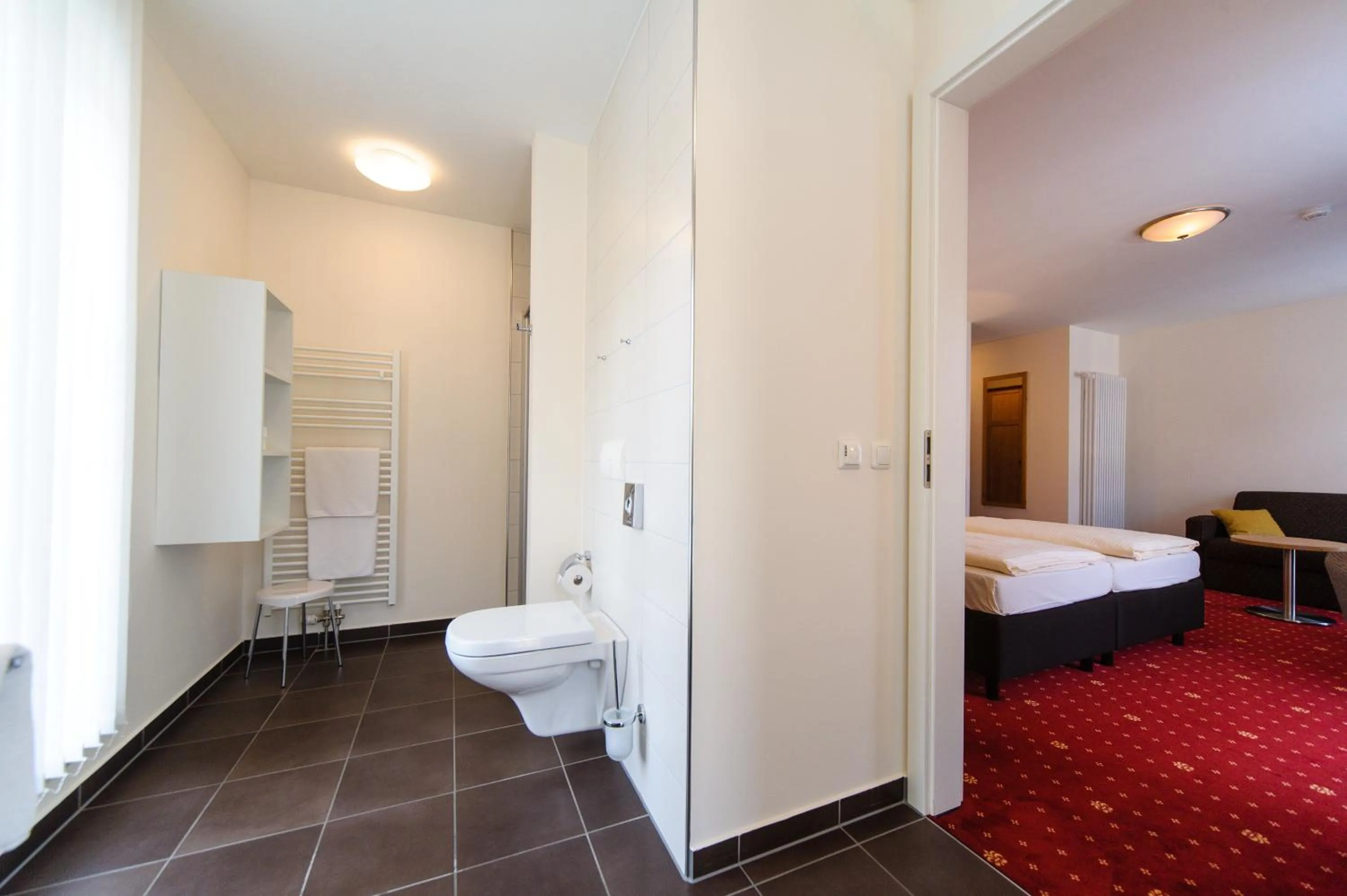 Bathroom, Bed in Akzent Hotel Goldner Stern