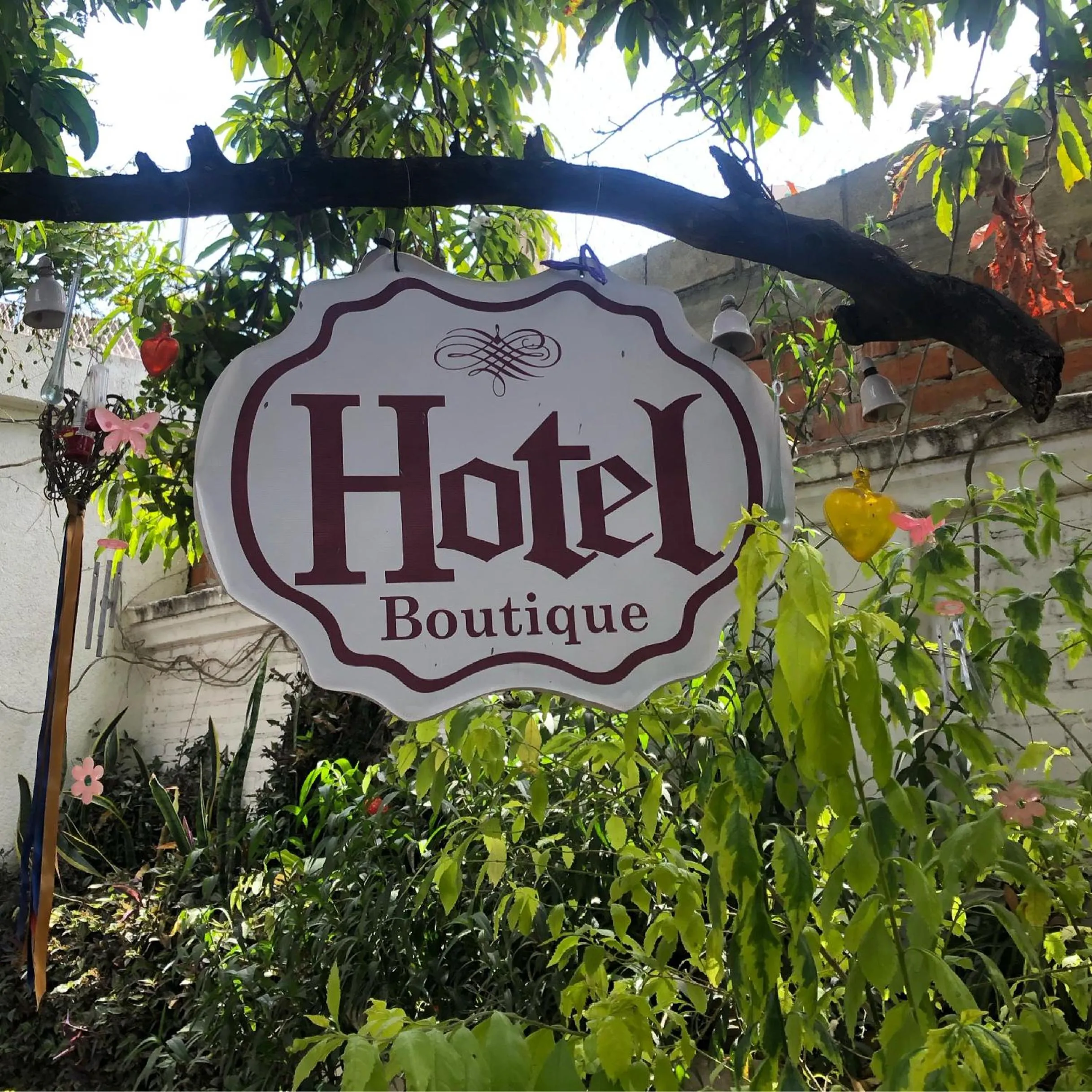 Property logo or sign in Hotel Boutique El Sueño del Coronel