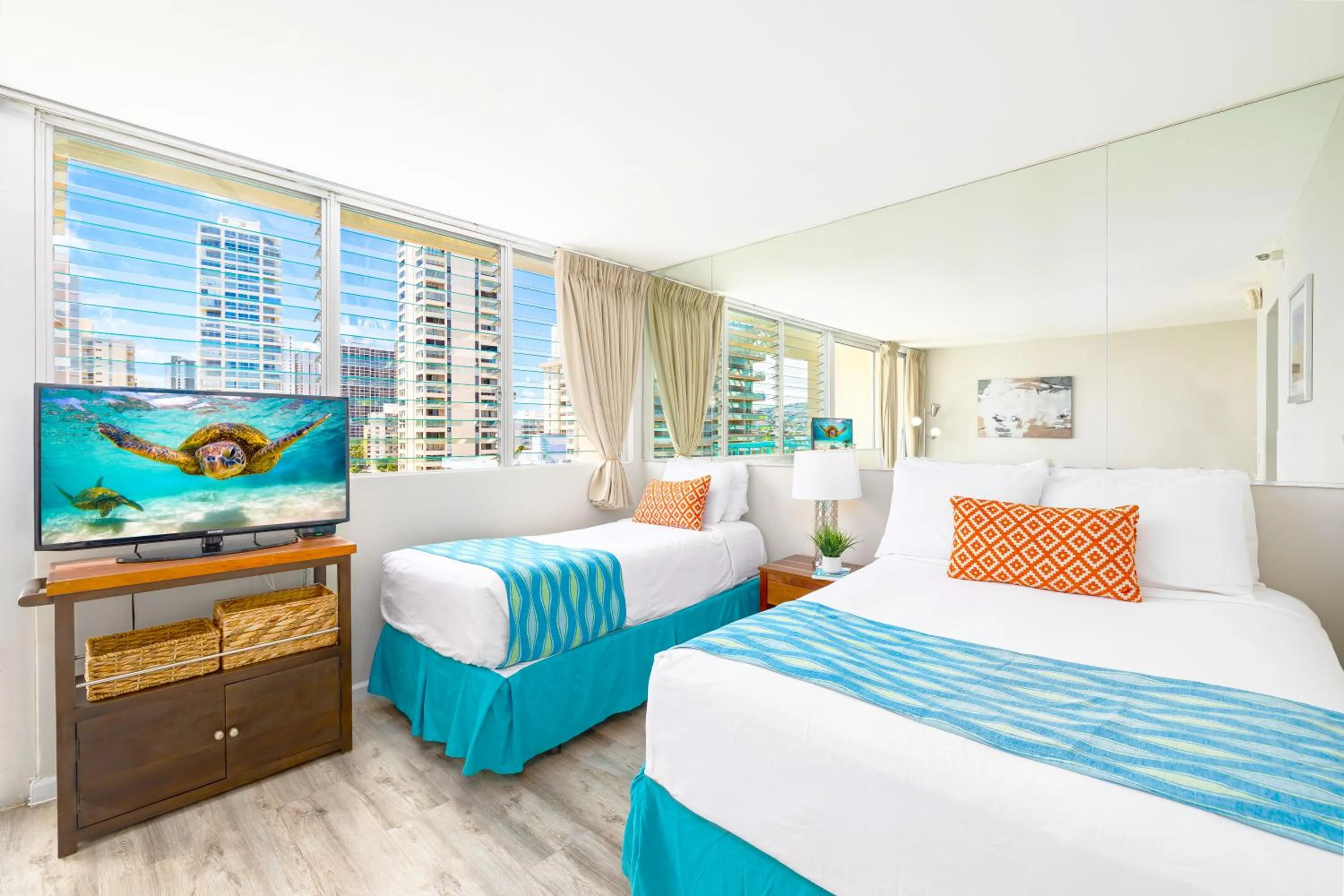 Bed in Cozy Waikiki Studio at Aqua Aloha Surf