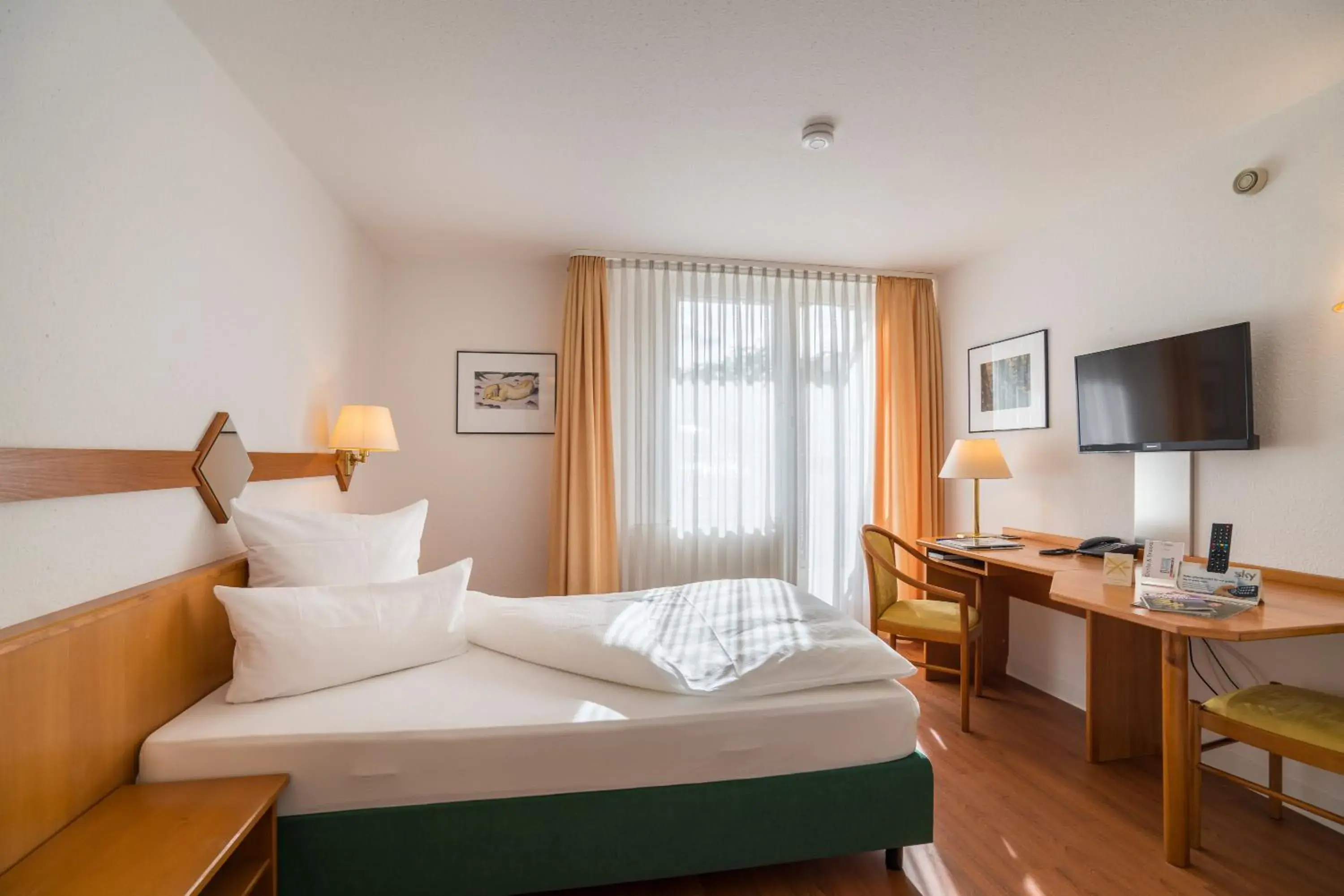 Photo of the whole room, Bed in Residenzhotel Stuttgart Airport, Sure Hotel Collection by Best Western Photo of the whole room, Bed in Residenzhotel Stuttgart Airport, Sure Hotel Collection by Best Western