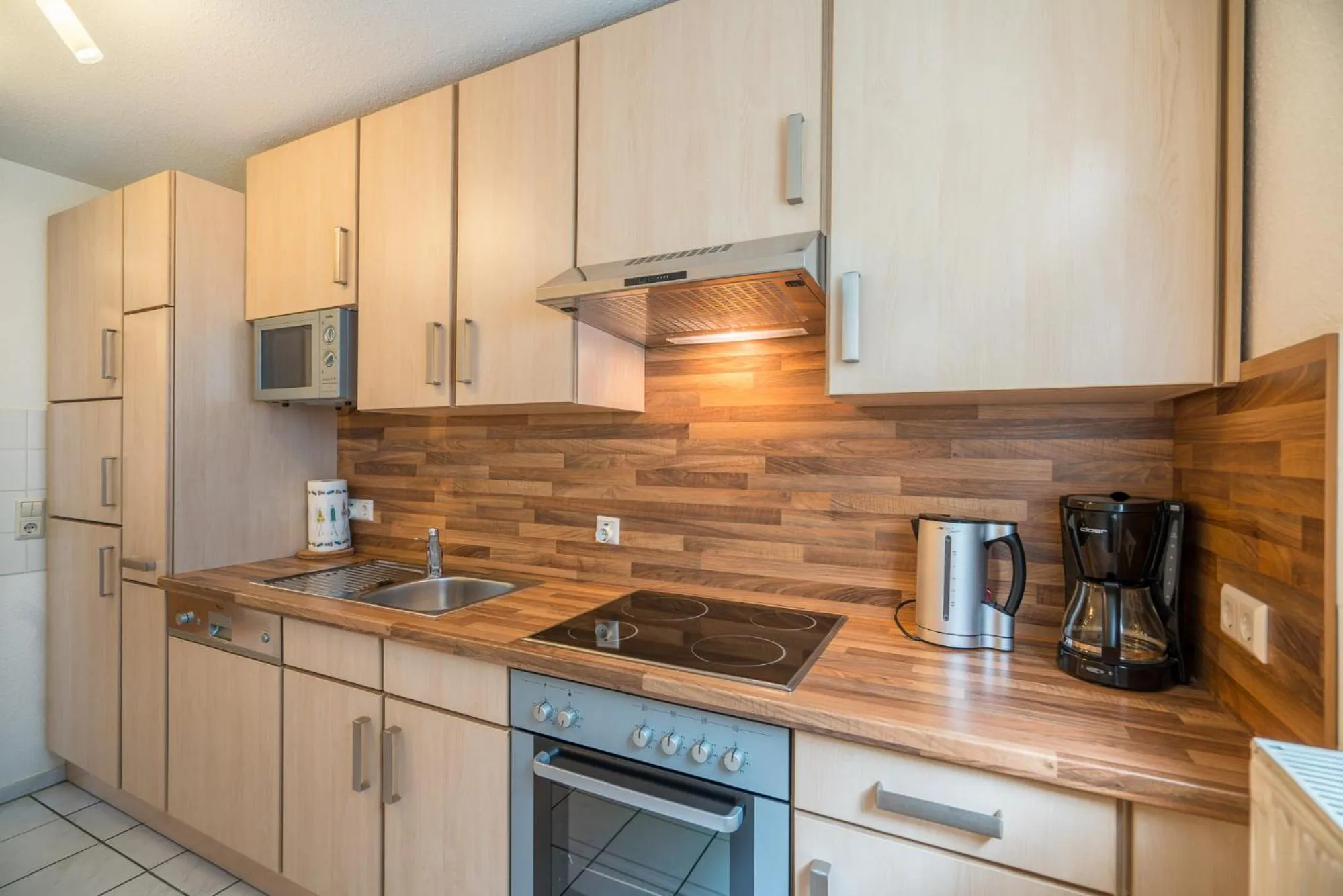 Kitchen or kitchenette in Apartmenthotel Residenz Steinenbronn