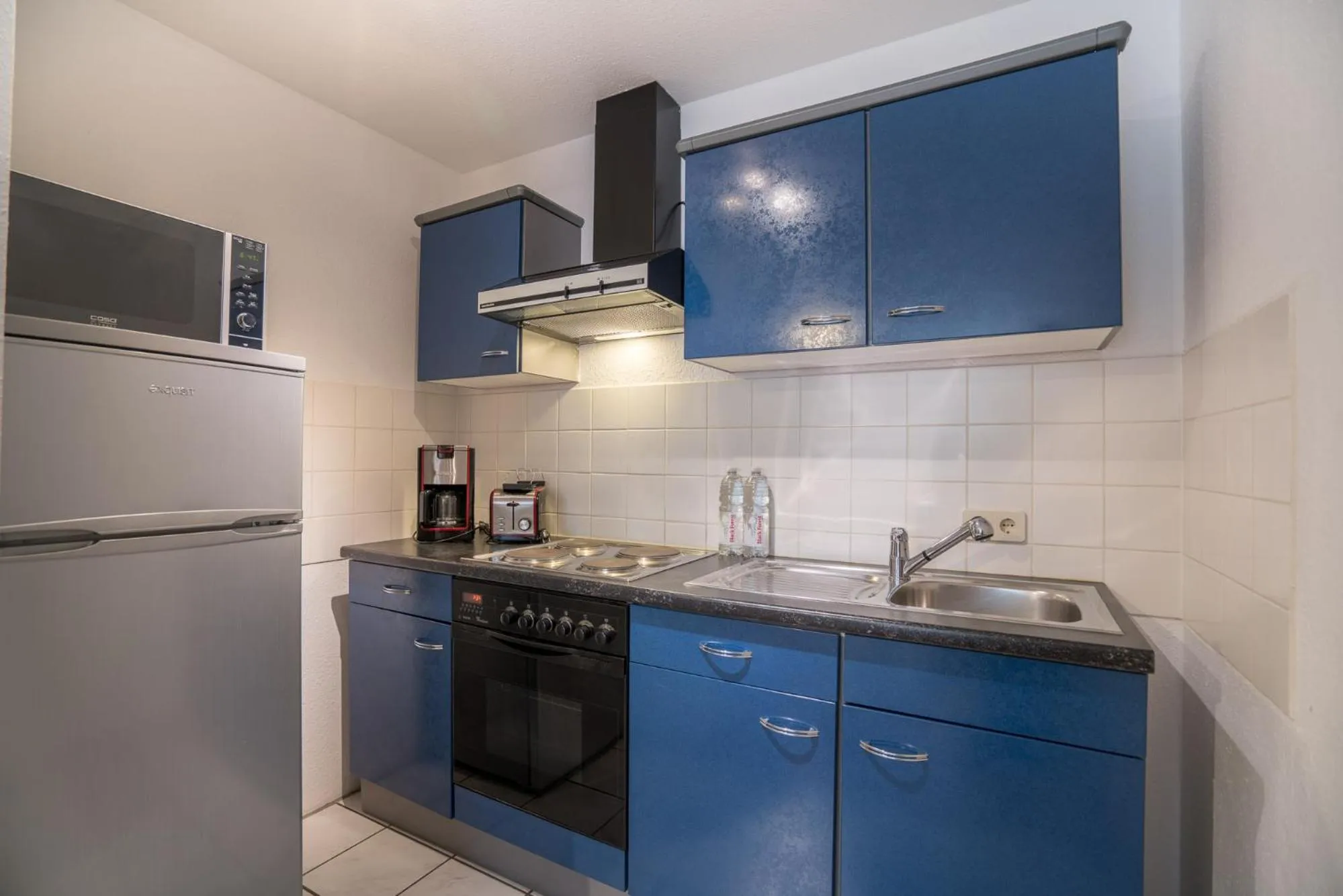 Kitchen or kitchenette in Apartmenthotel Residenz Steinenbronn