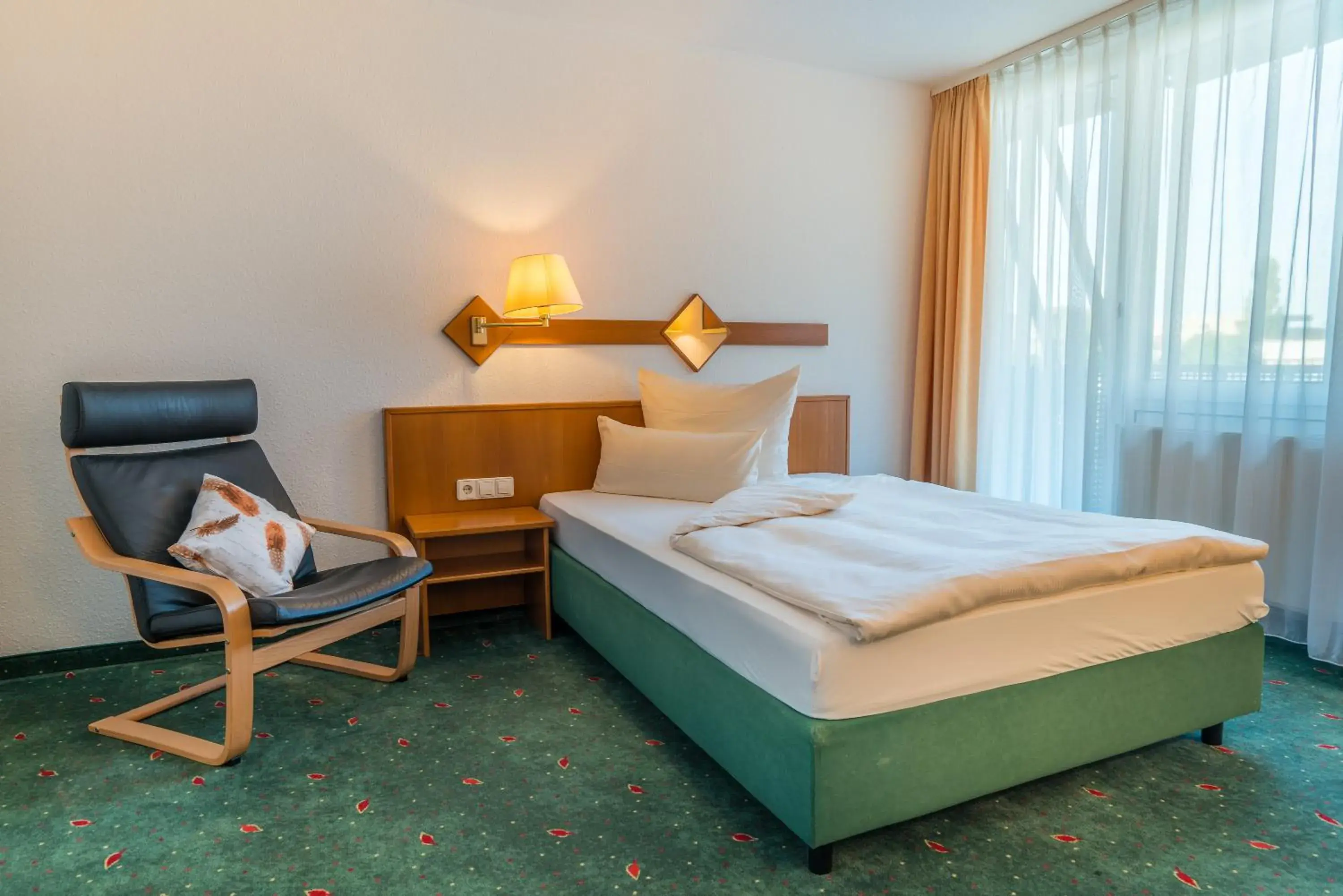 Photo of the whole room, Bed in Residenzhotel Stuttgart Airport, Sure Hotel Collection by Best Western Photo of the whole room, Bed in Residenzhotel Stuttgart Airport, Sure Hotel Collection by Best Western
