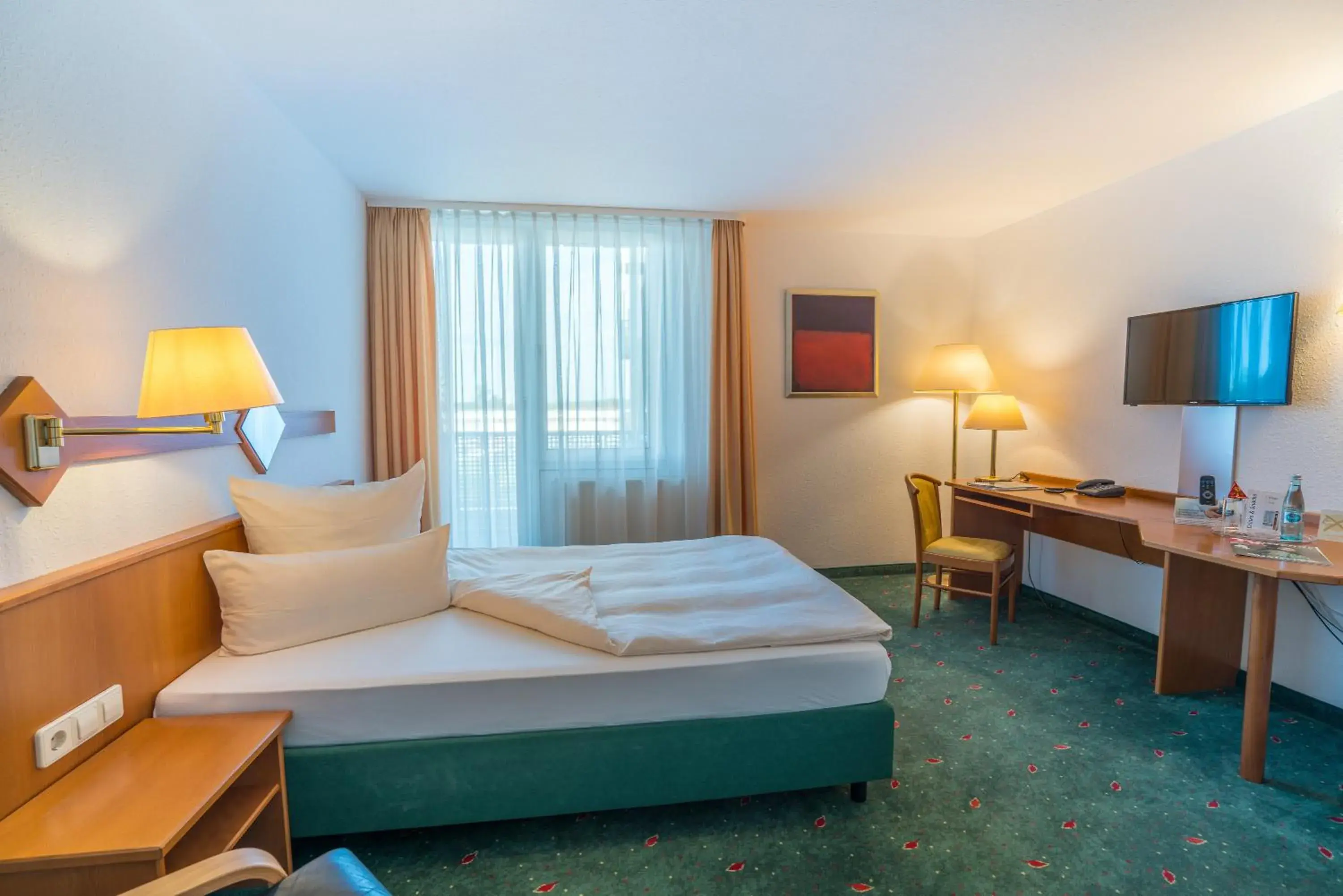 Photo of the whole room, Bed in Residenzhotel Stuttgart Airport, Sure Hotel Collection by Best Western Photo of the whole room, Bed in Residenzhotel Stuttgart Airport, Sure Hotel Collection by Best Western