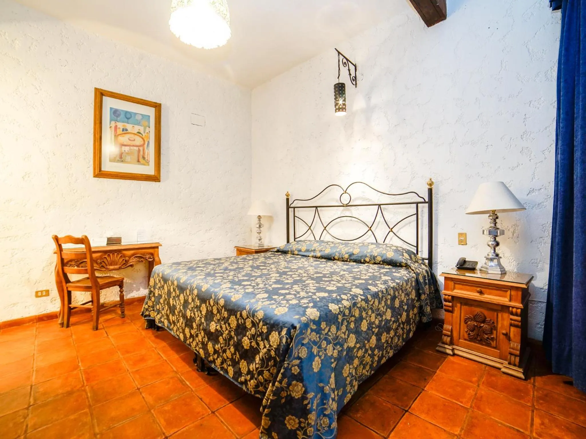 Bed in Hotel Mansión Virreyes by Rotamundos