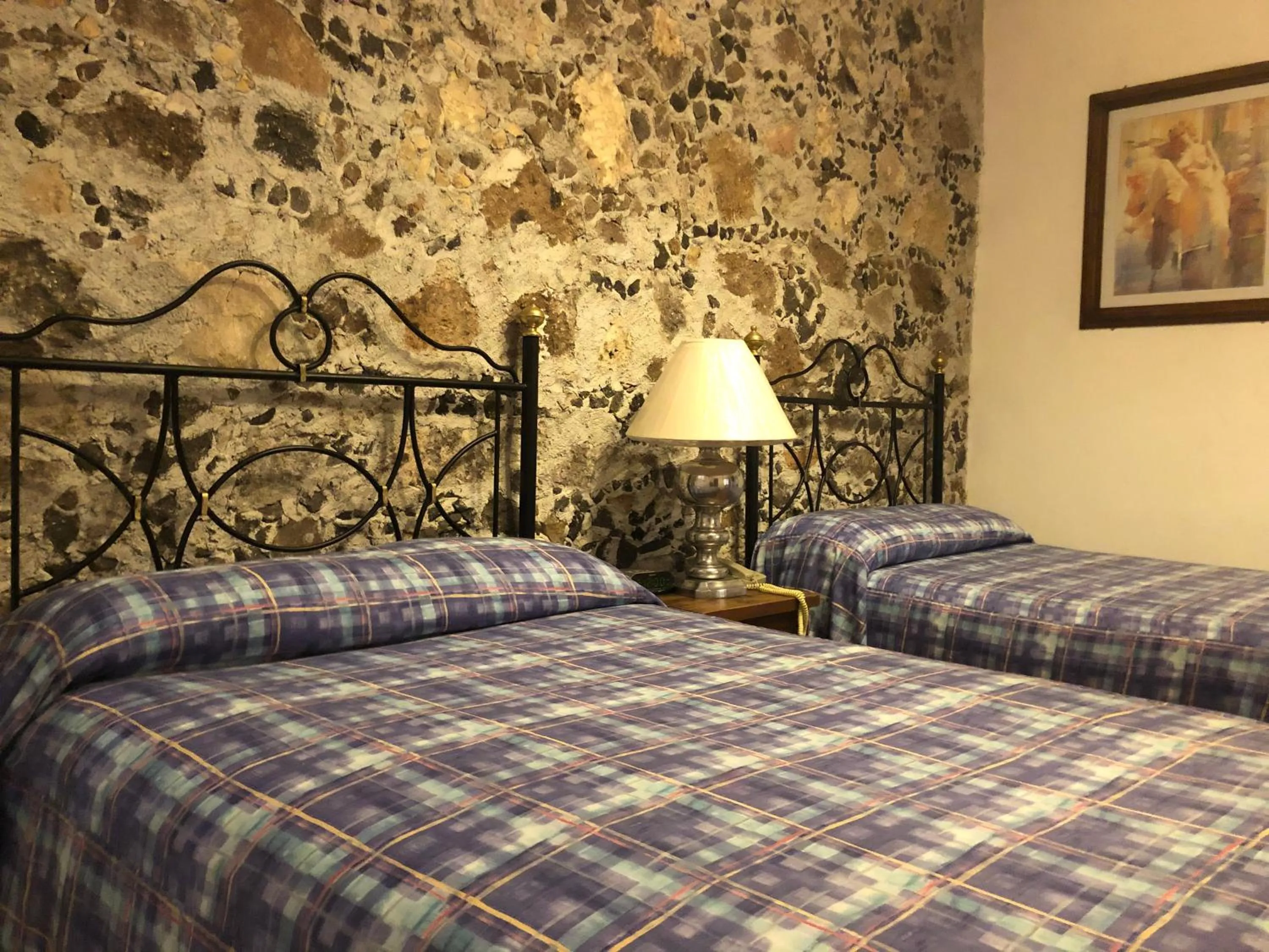 Bed in Hotel Mansión Virreyes by Rotamundos