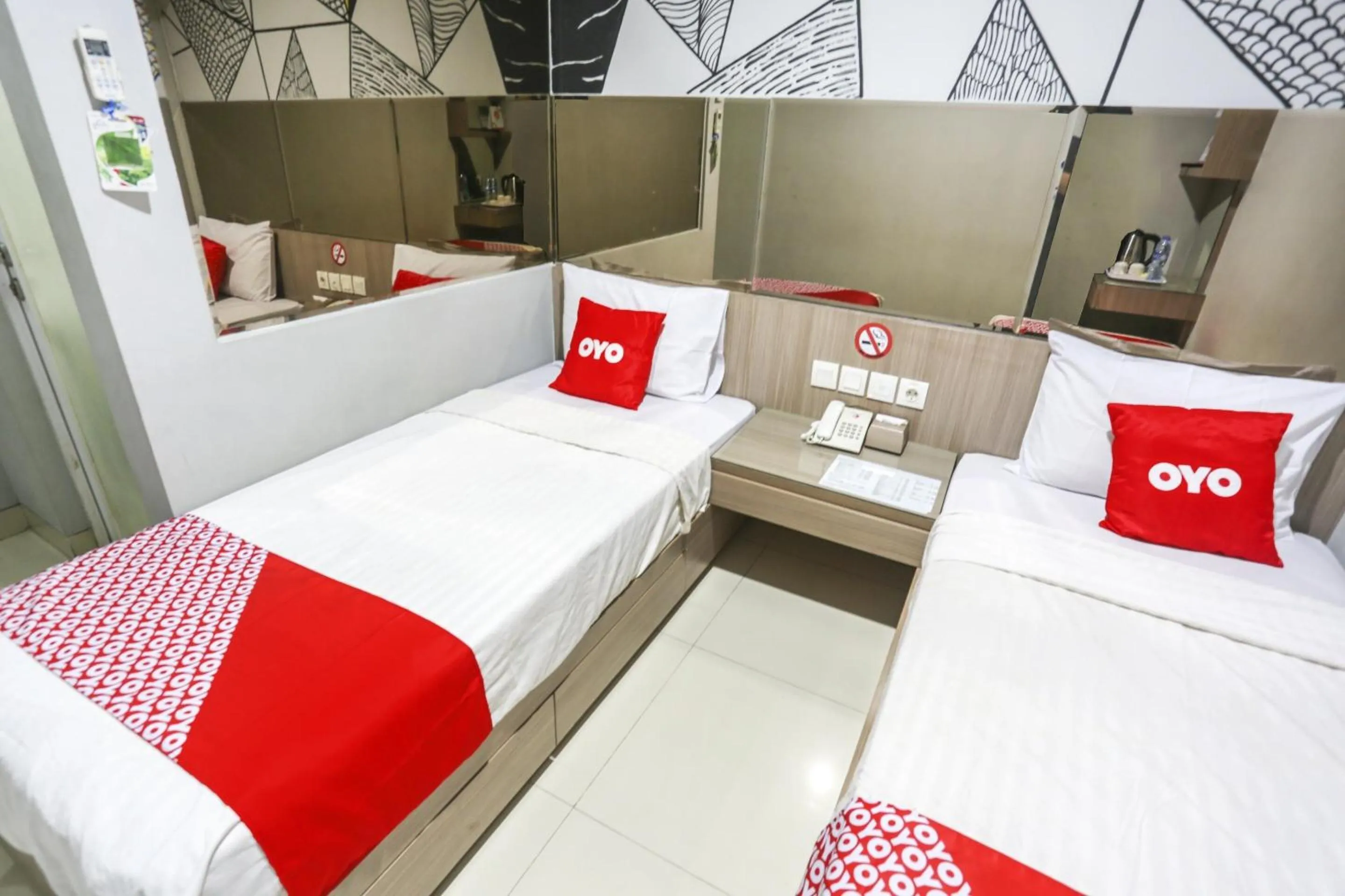 Bedroom in SUPER OYO Capital O 90056 Wisma Kebon Kacang 9