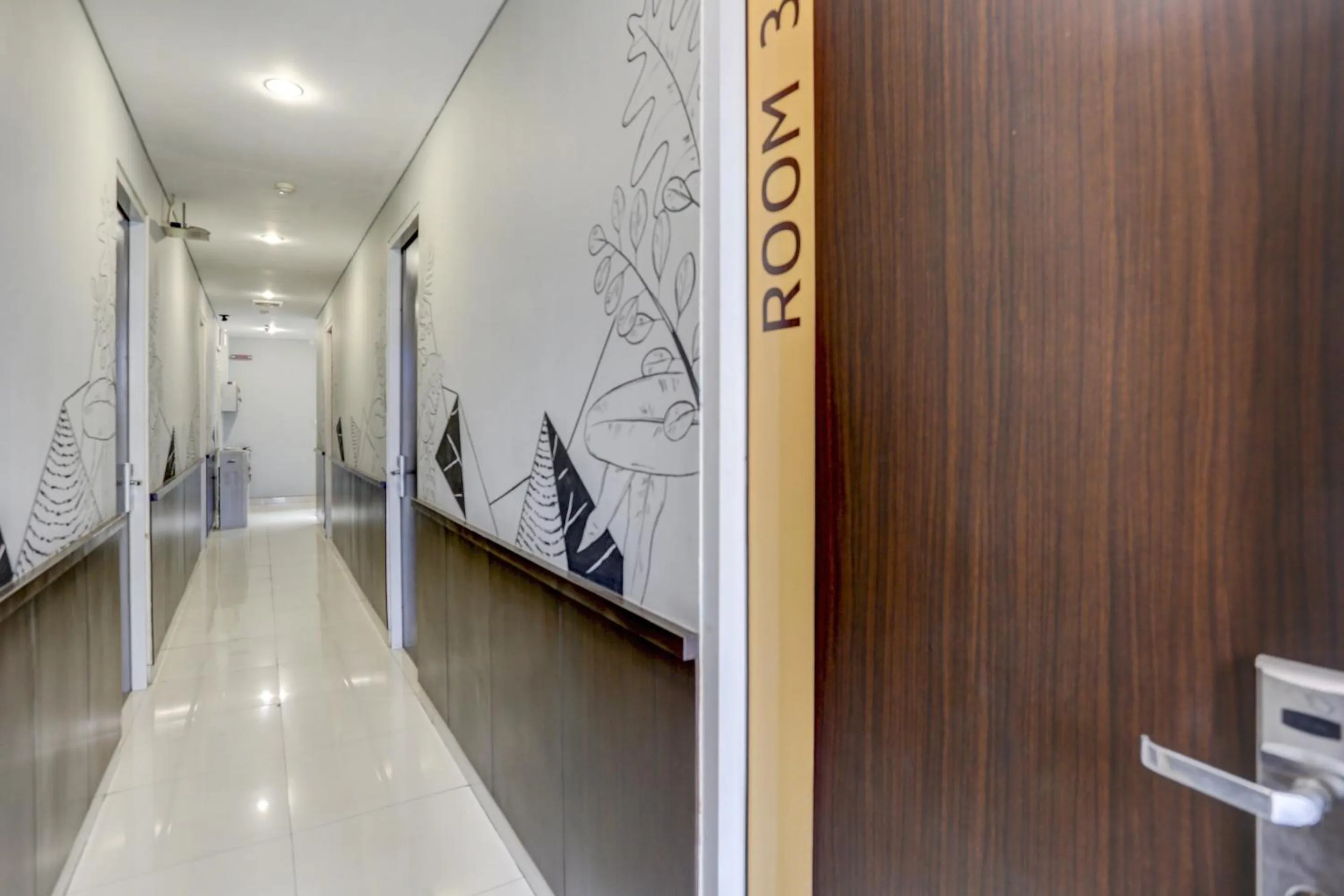 Lobby or reception in SUPER OYO Capital O 90056 Wisma Kebon Kacang 9