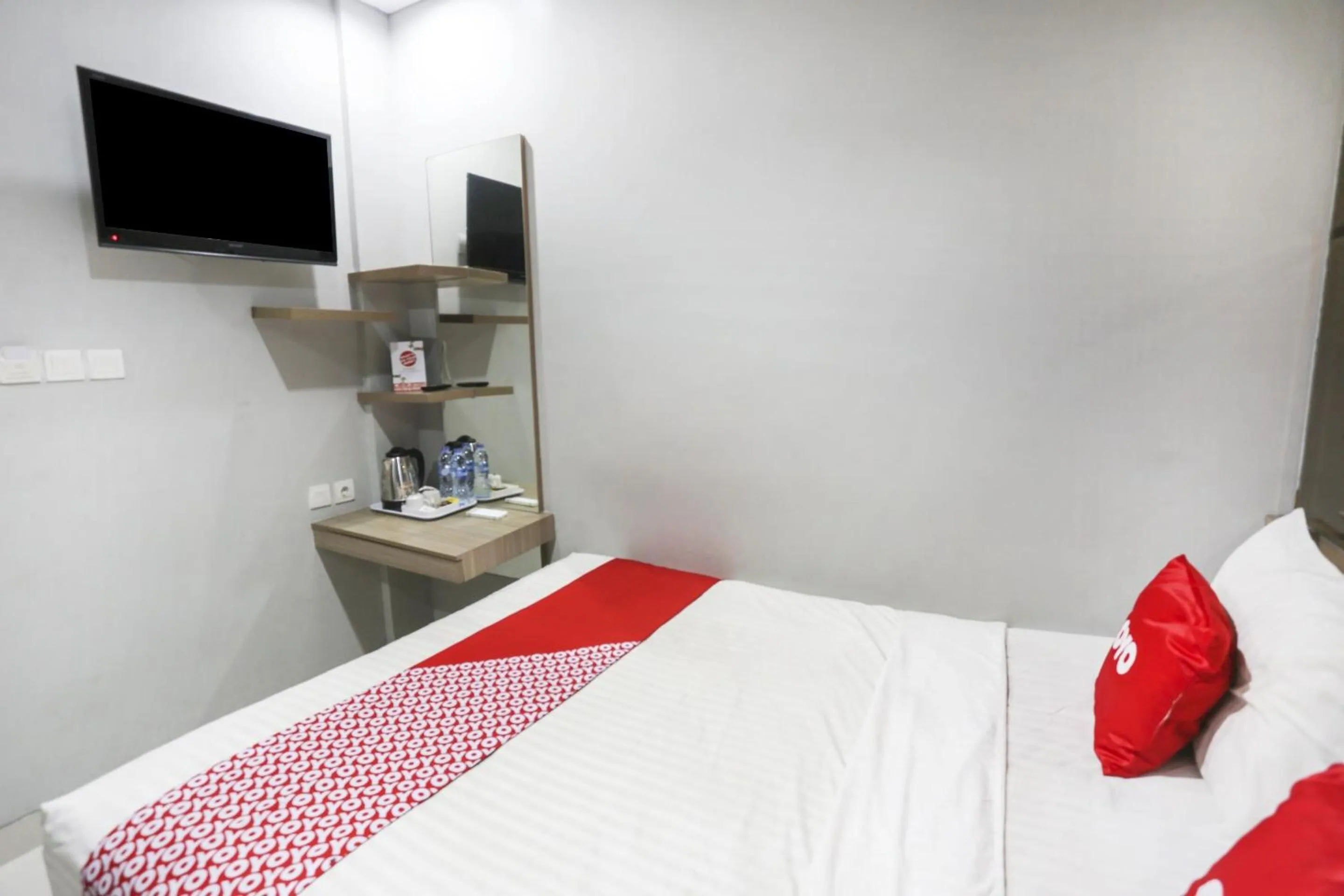 Bedroom in SUPER OYO Capital O 90056 Wisma Kebon Kacang 9