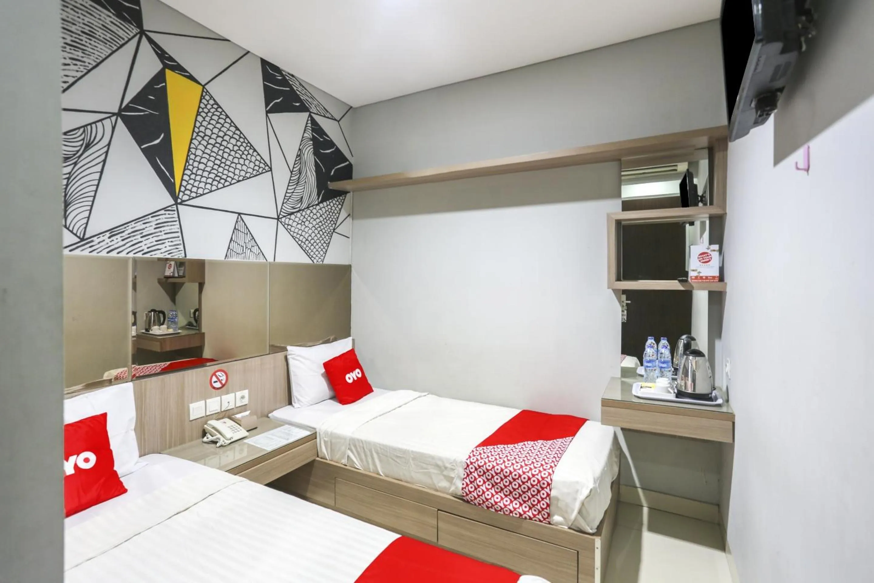 Bedroom in SUPER OYO Capital O 90056 Wisma Kebon Kacang 9