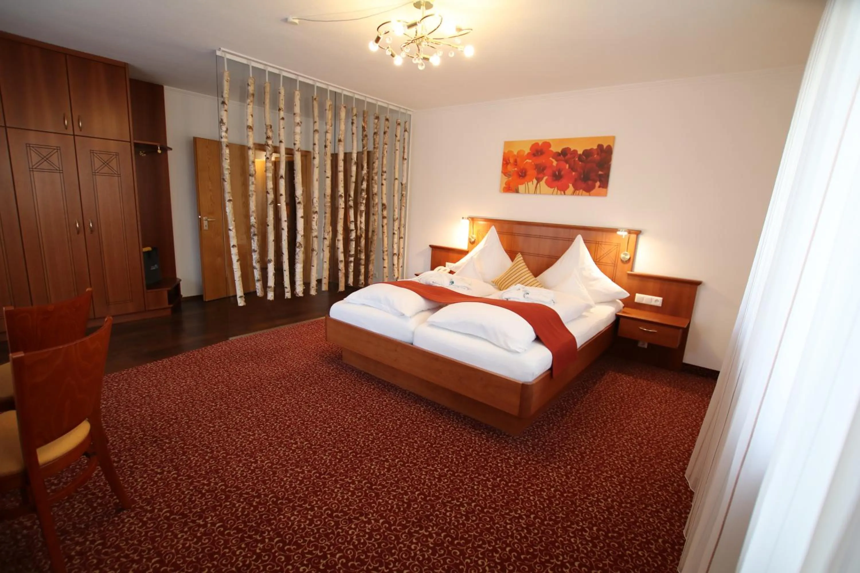 Photo of the whole room, Bed in ANGERHOF Kur- und Thermenhotel