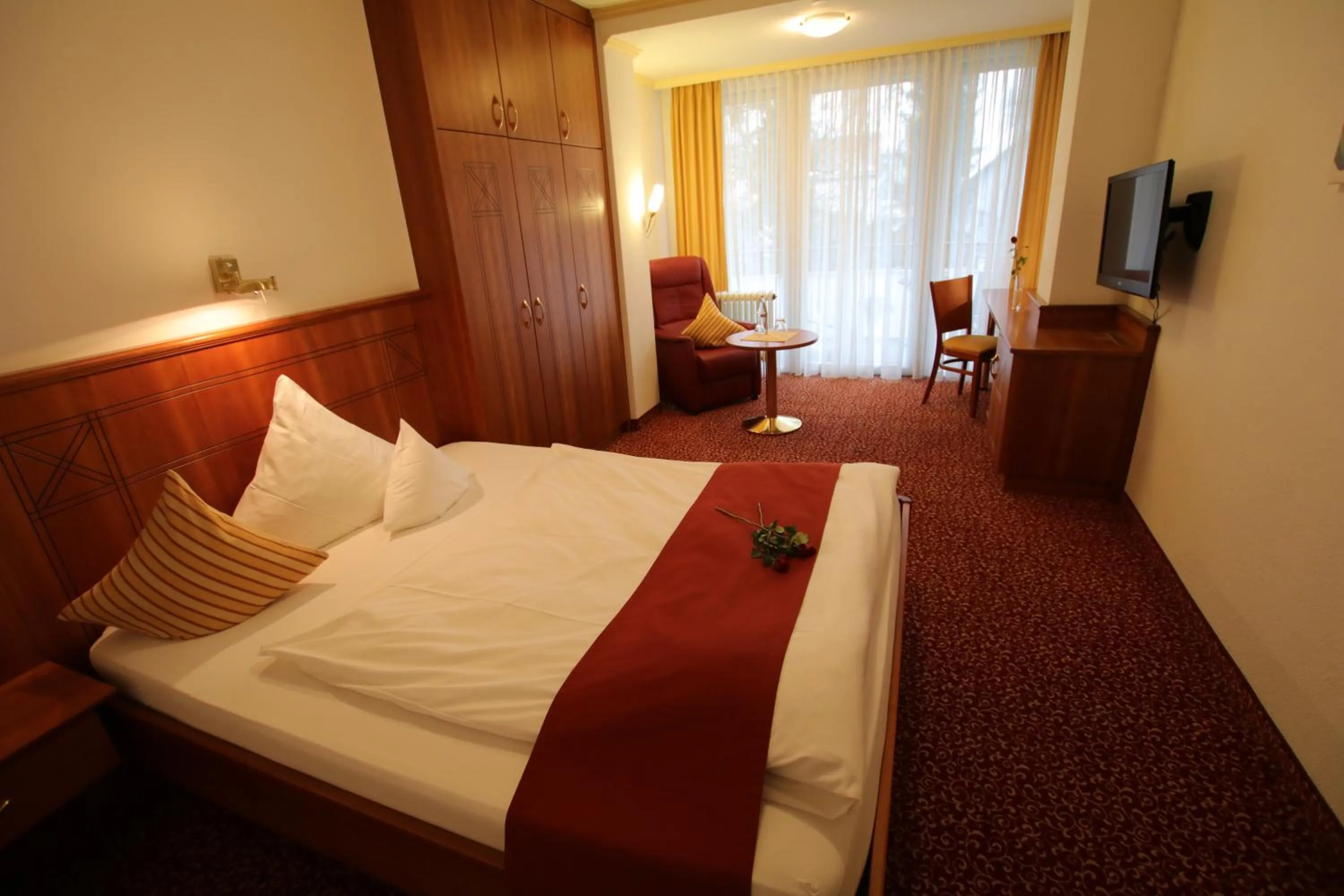 Photo of the whole room, Bed in ANGERHOF Kur- und Thermenhotel