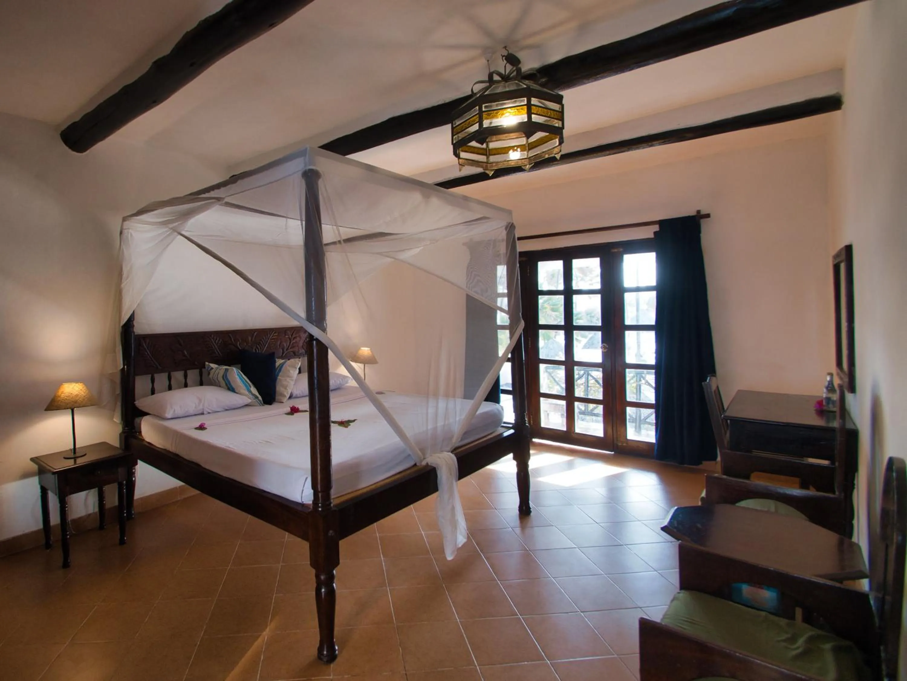 Bed in Barracuda Inn Resort