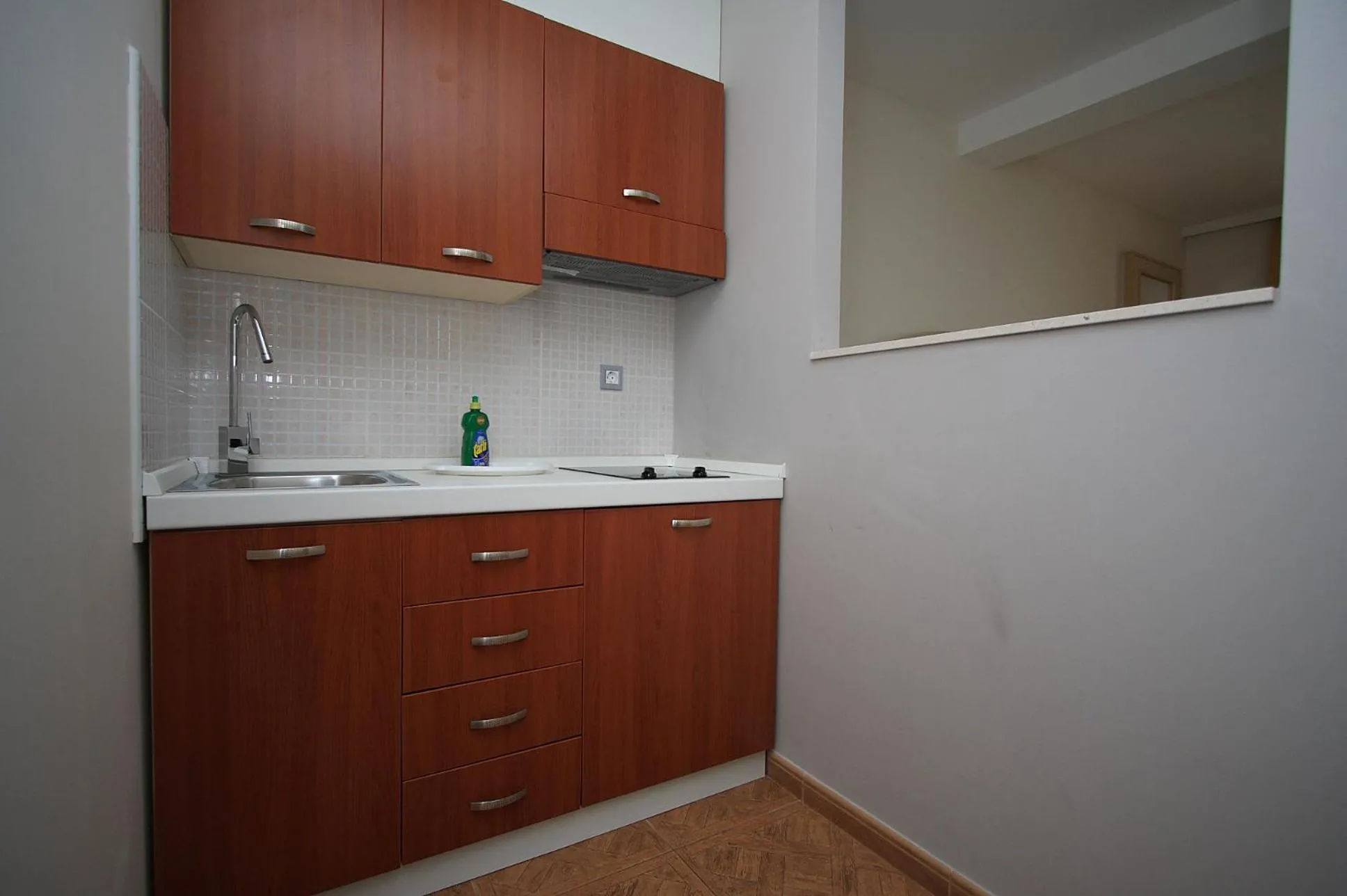 Kitchen or kitchenette in Aparthotel Natalia Podgora