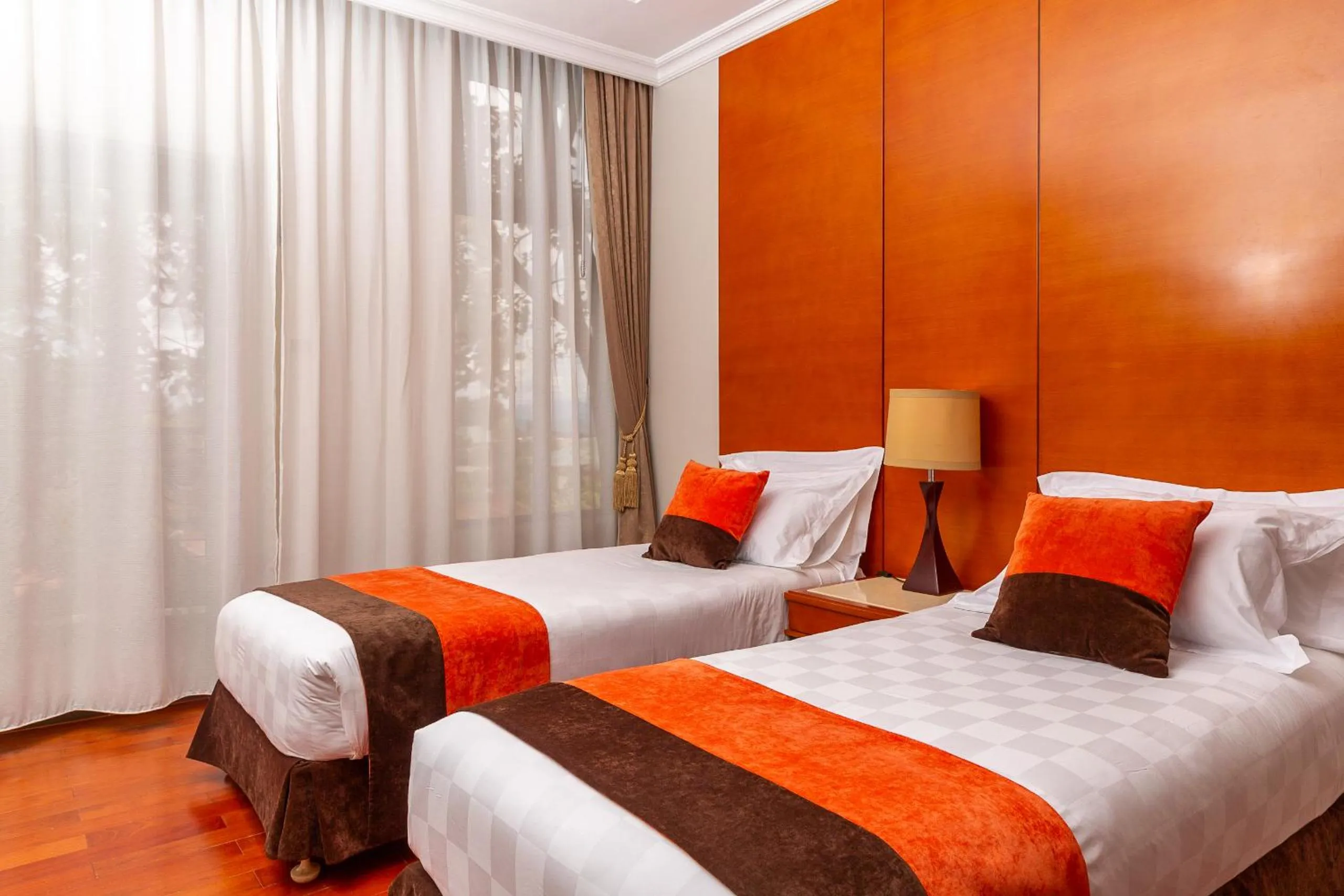 Bed in Alba Hotel Meru