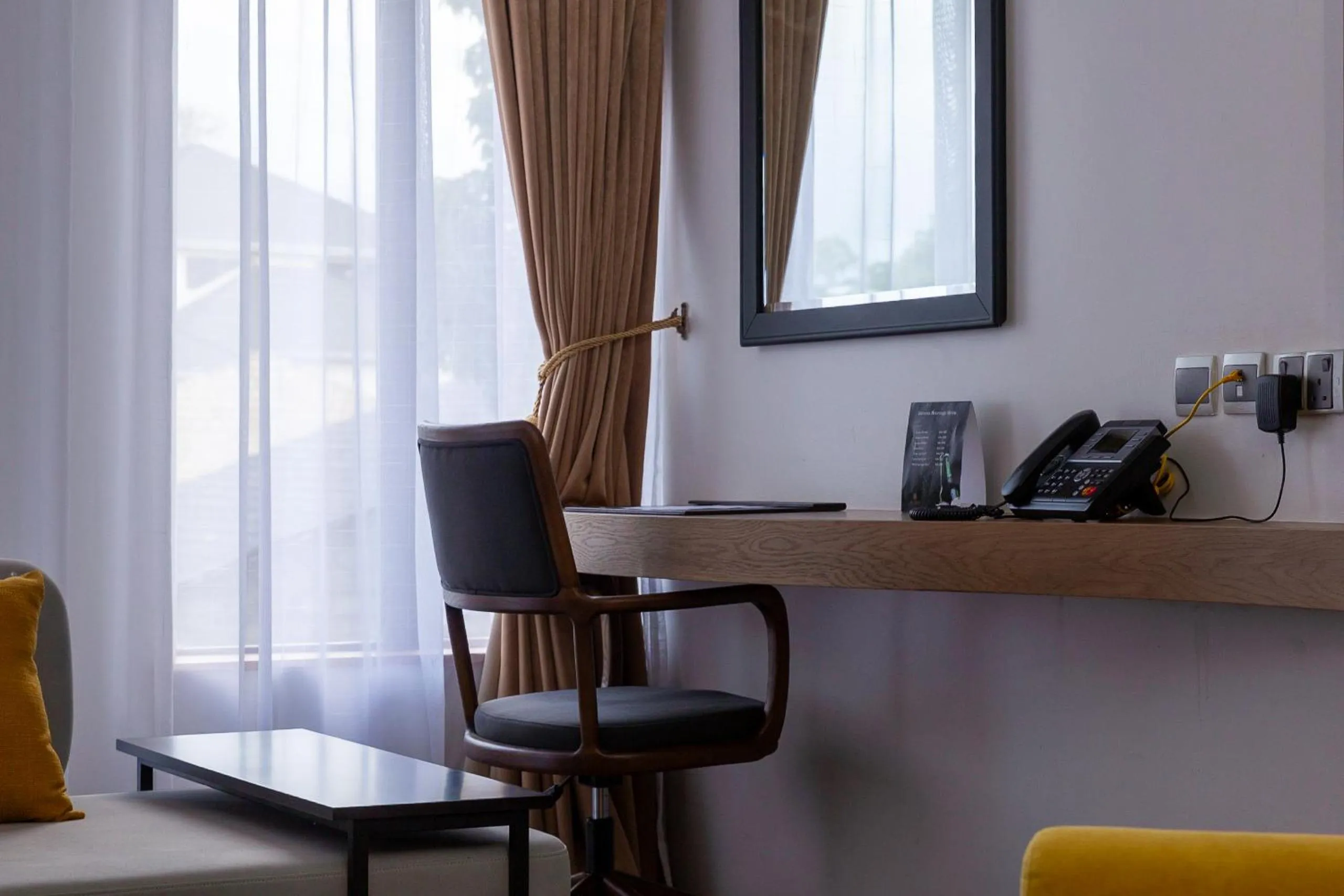 Seating area in Alba Hotel Meru