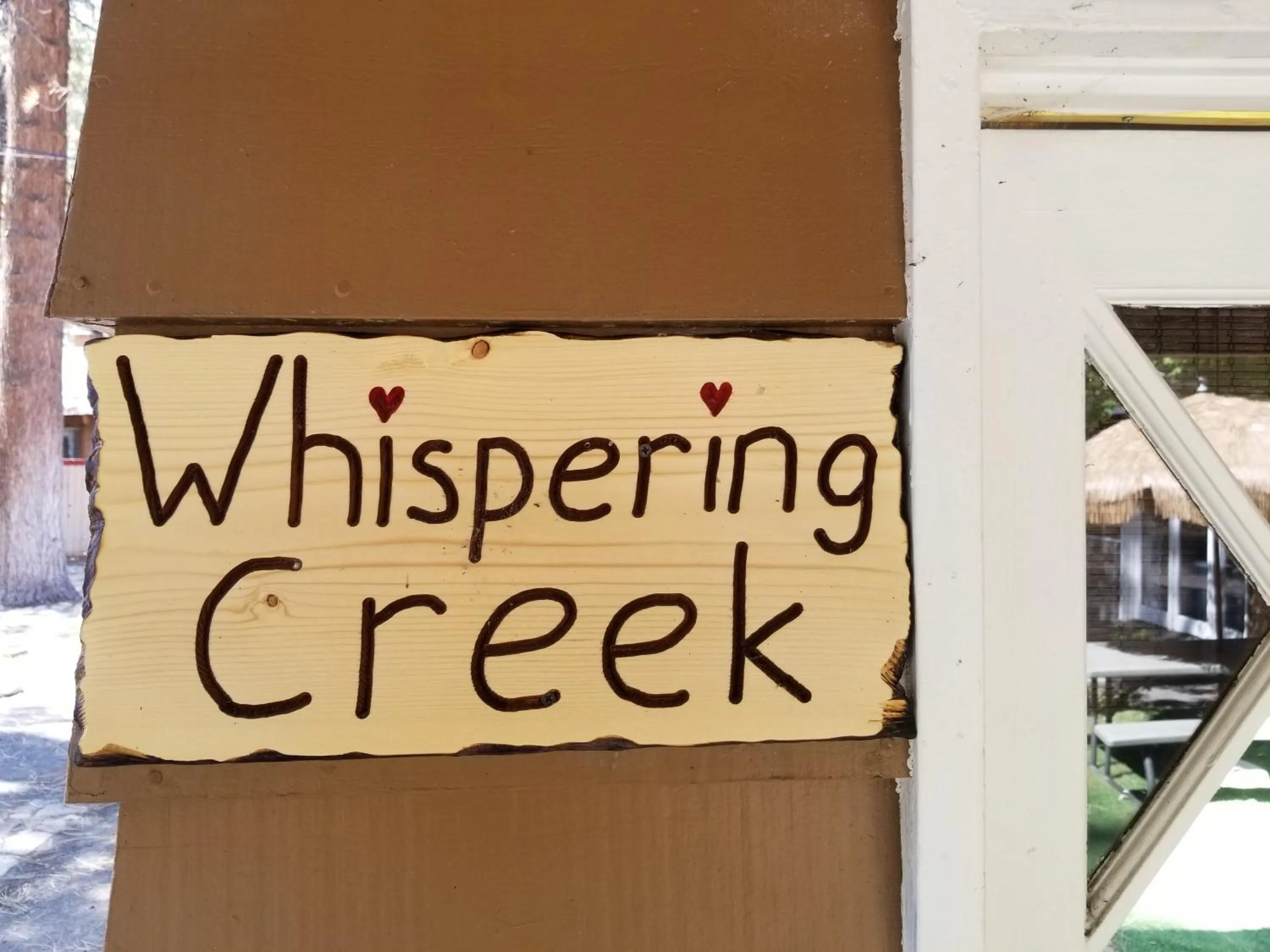 Property logo or sign in Grey Squirrel Resort