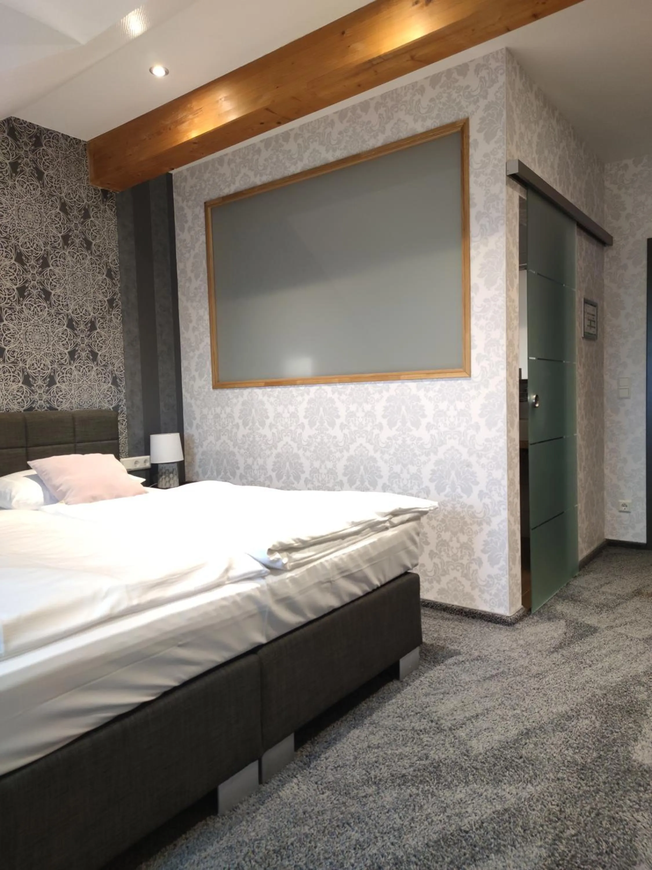 Photo of the whole room, Bed in Seehotel Losheim