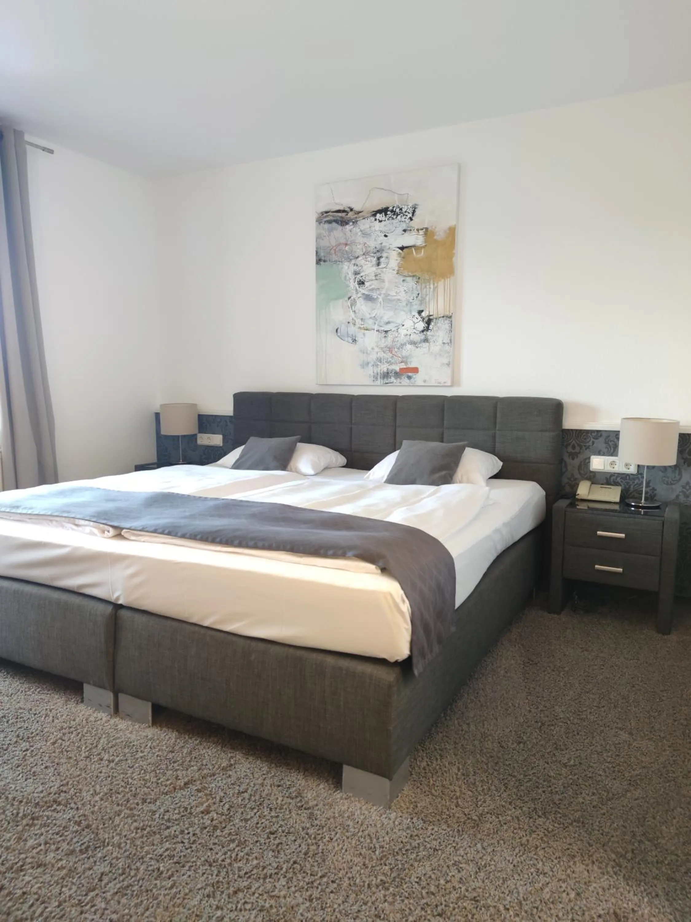 Photo of the whole room, Bed in Seehotel Losheim