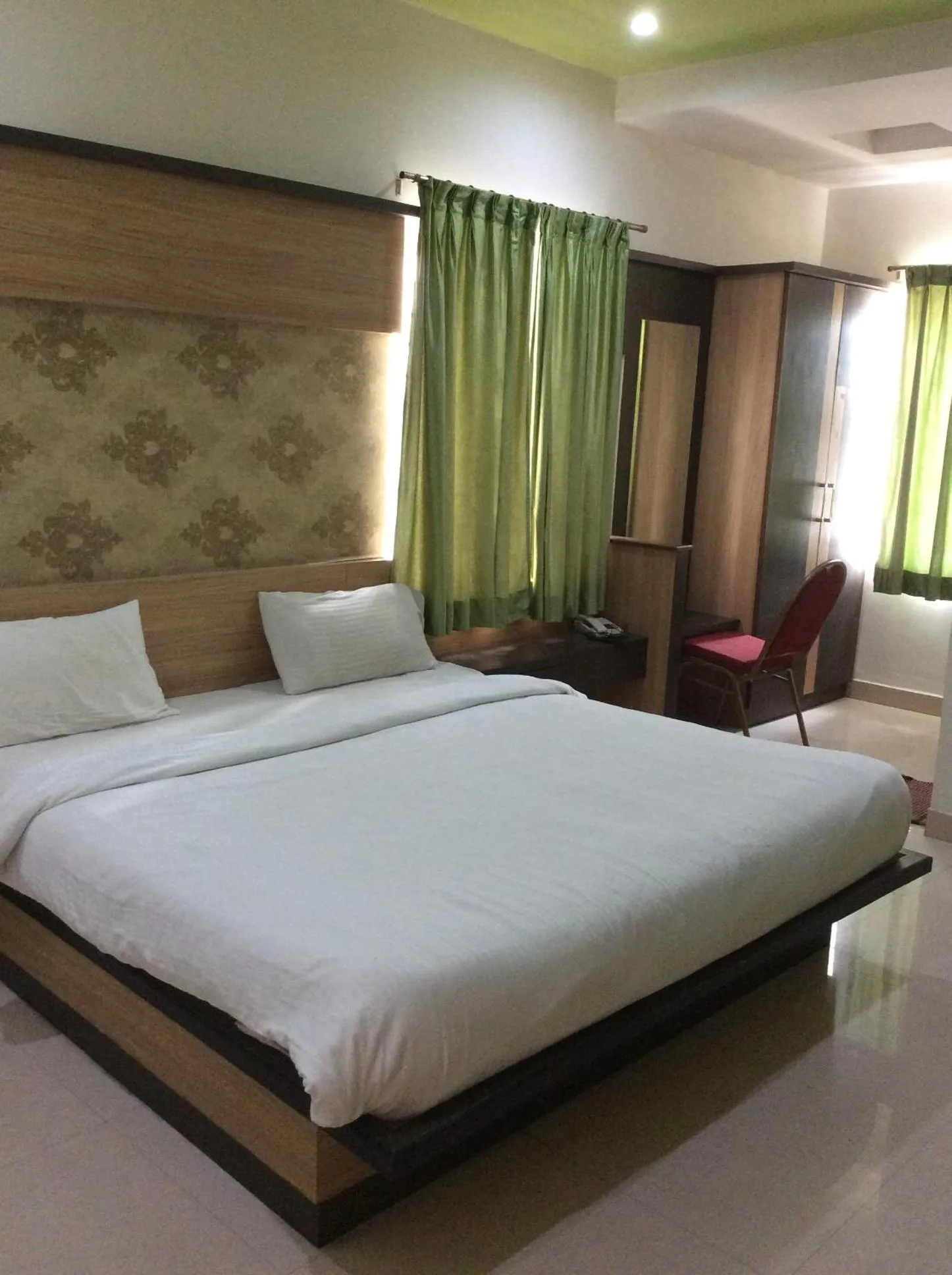 Bed in HOTEL SRI VAARI RESIDENCY