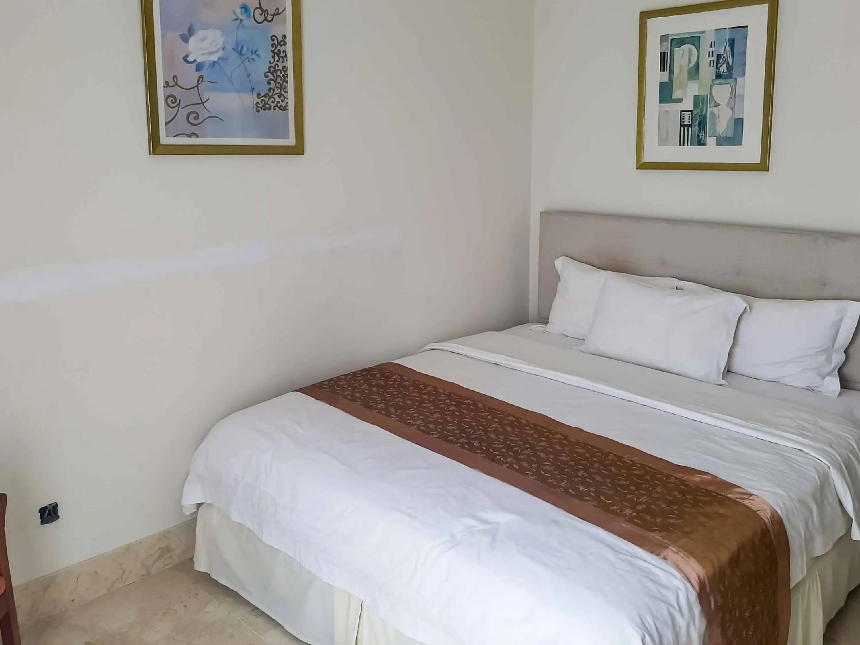 Bed in Bangka Suite Mitra RedDoorz