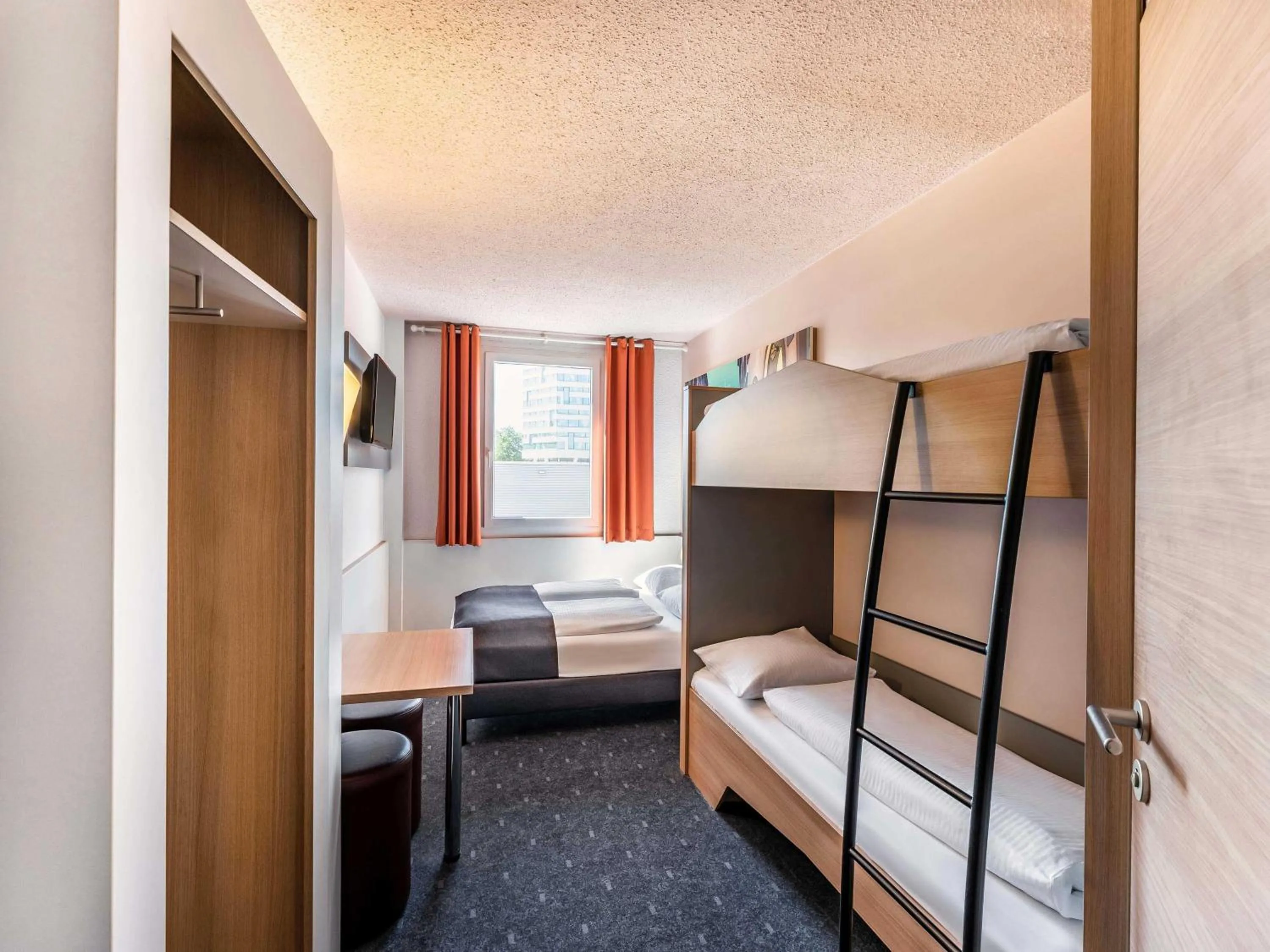 Photo of the whole room, Bed in B&B Hotel Freiburg-Nord