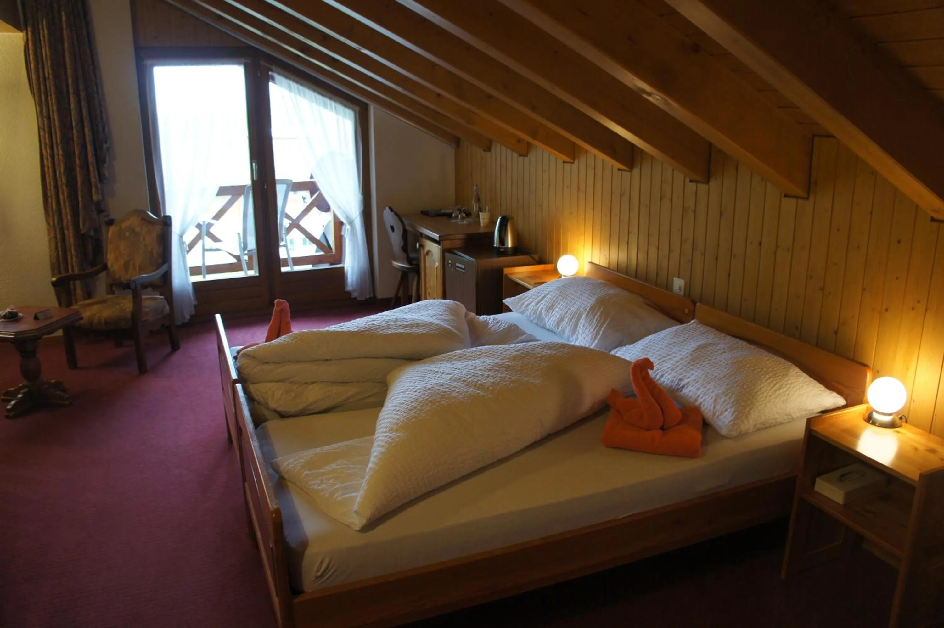 Bed in Hotel Alpenhof