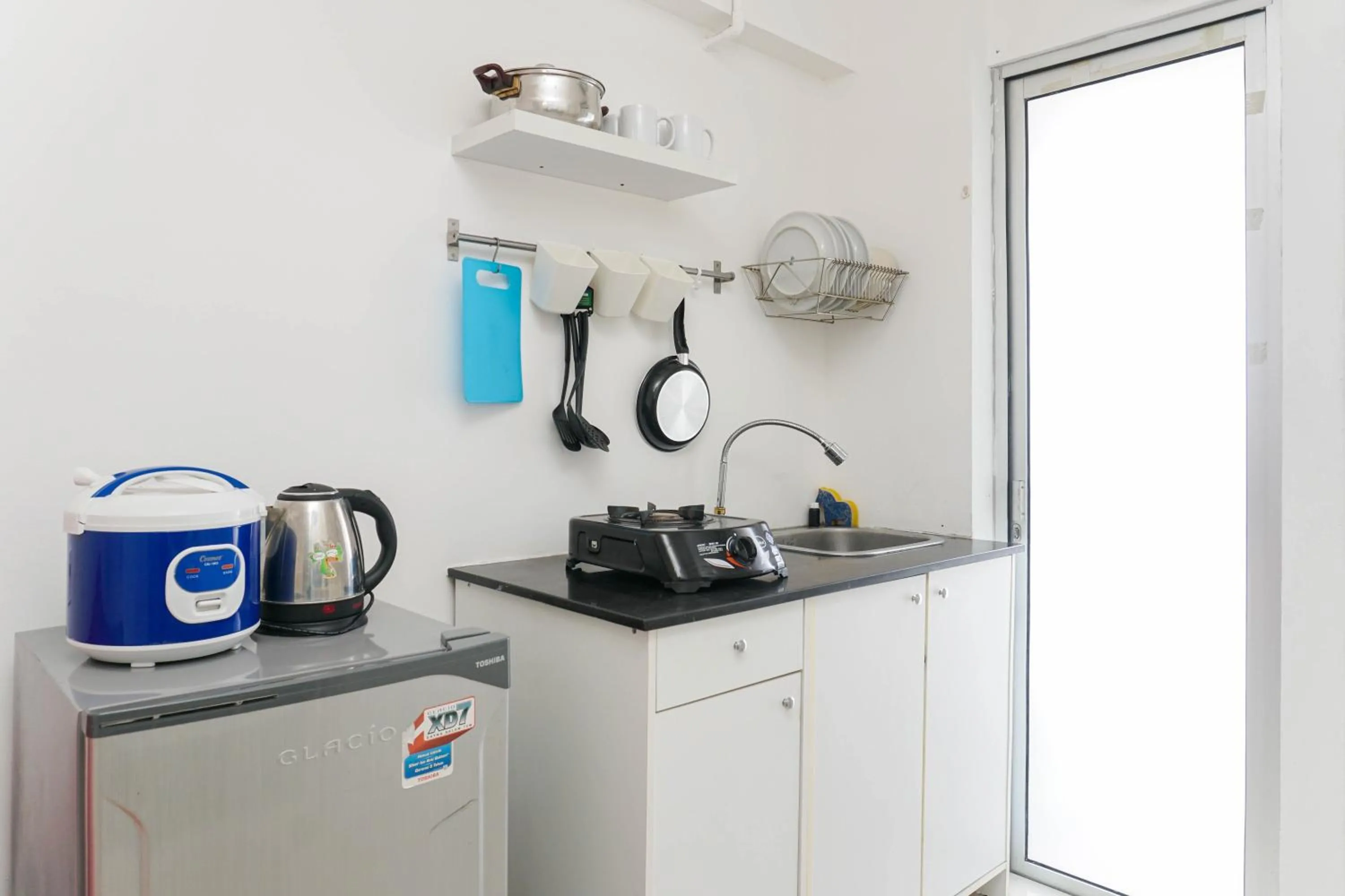 Comfy and Furnished 2BR Bassura City Apartment near Mall By Travelio