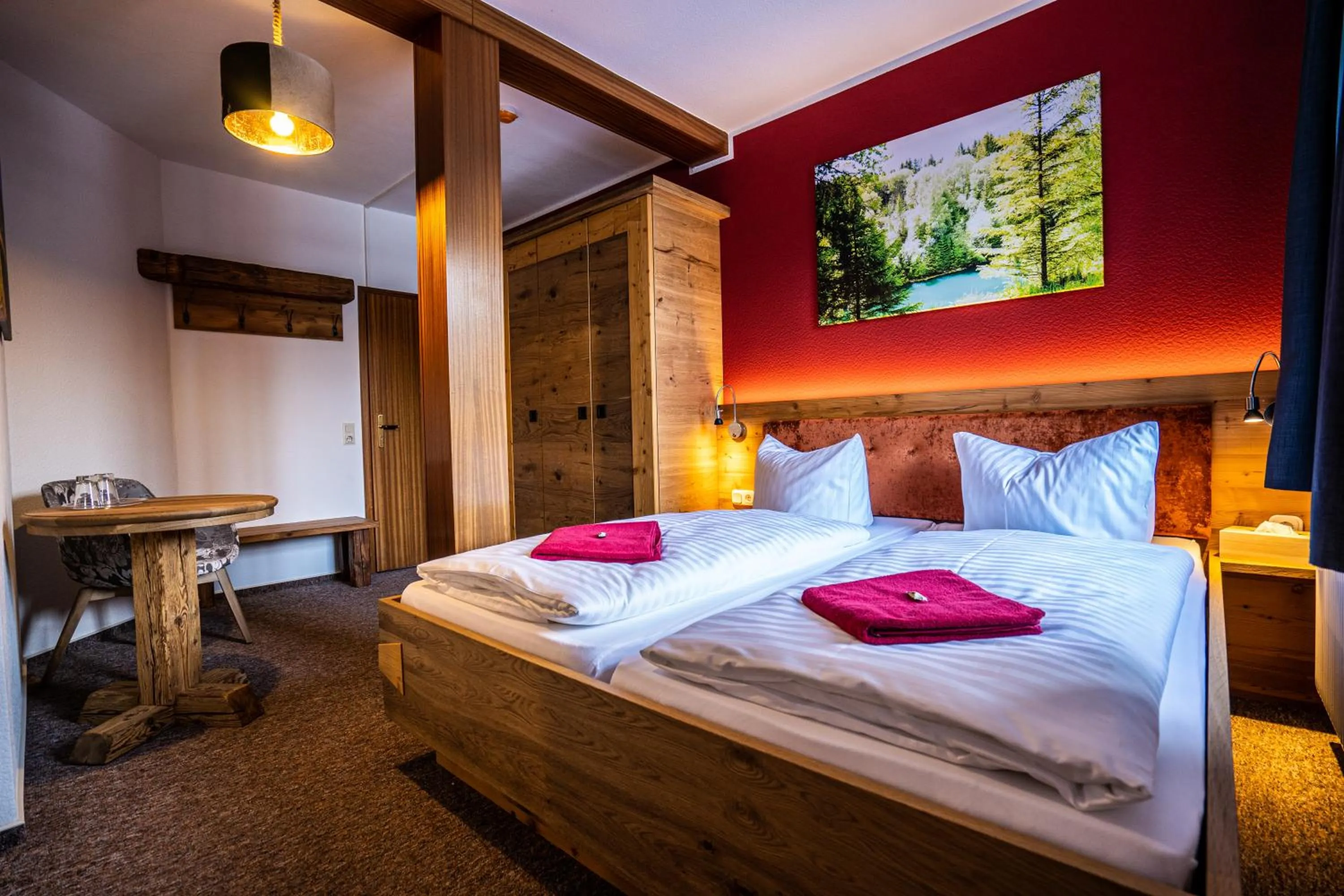 Photo of the whole room, Bed in Berghotel Bärenstein