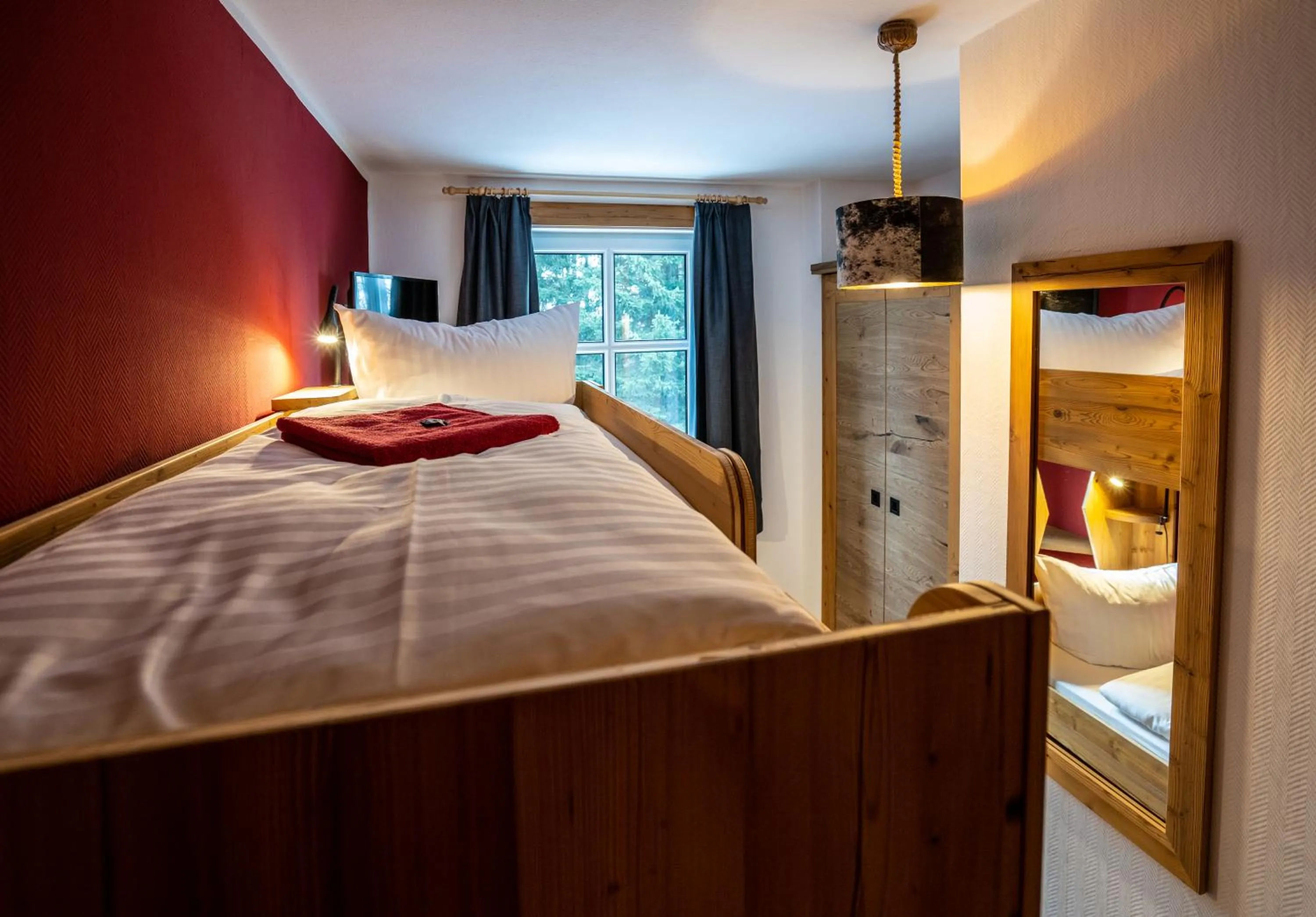 Photo of the whole room, Bed in Berghotel Bärenstein