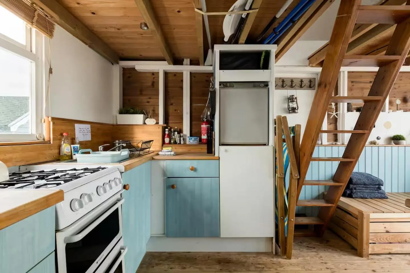 kitchen in Stargazing Beach Hut on Mudeford Sandbank with wake up sea views