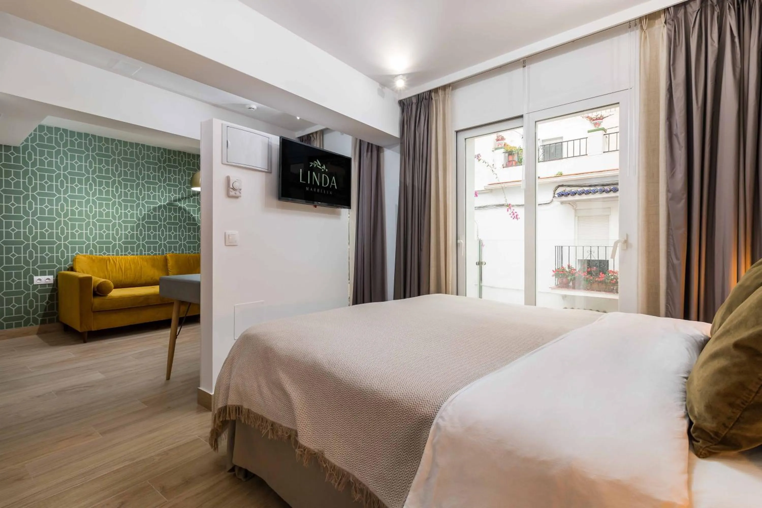 Bed in Linda Boutique Hotel