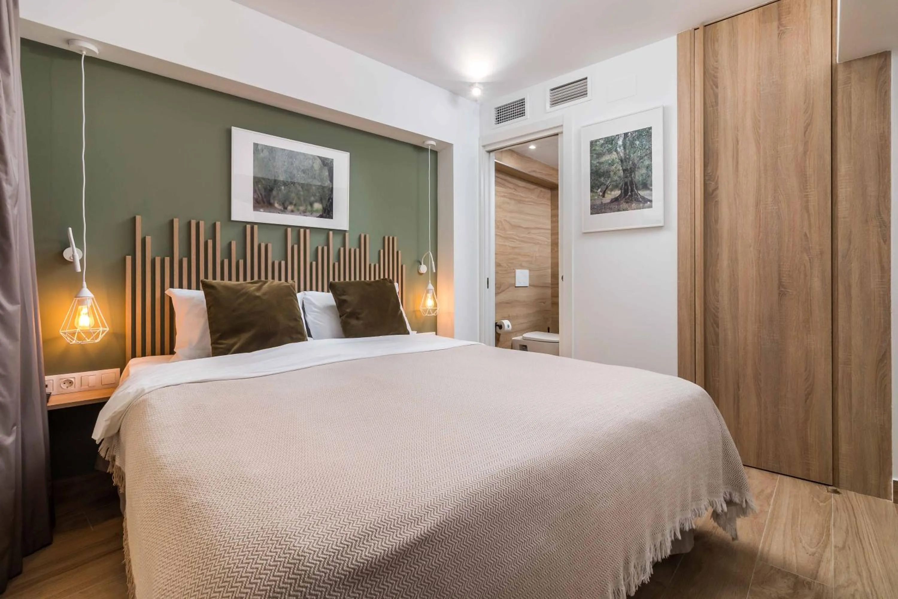 Bed in Linda Boutique Hotel