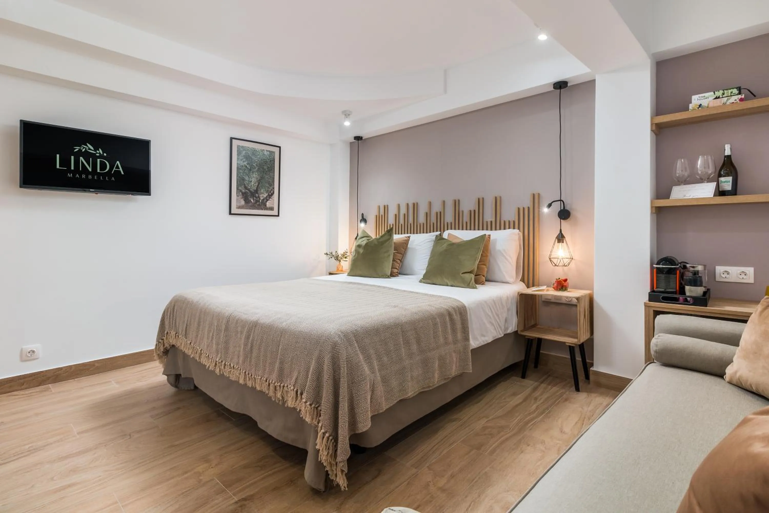 Bed in Linda Boutique Hotel