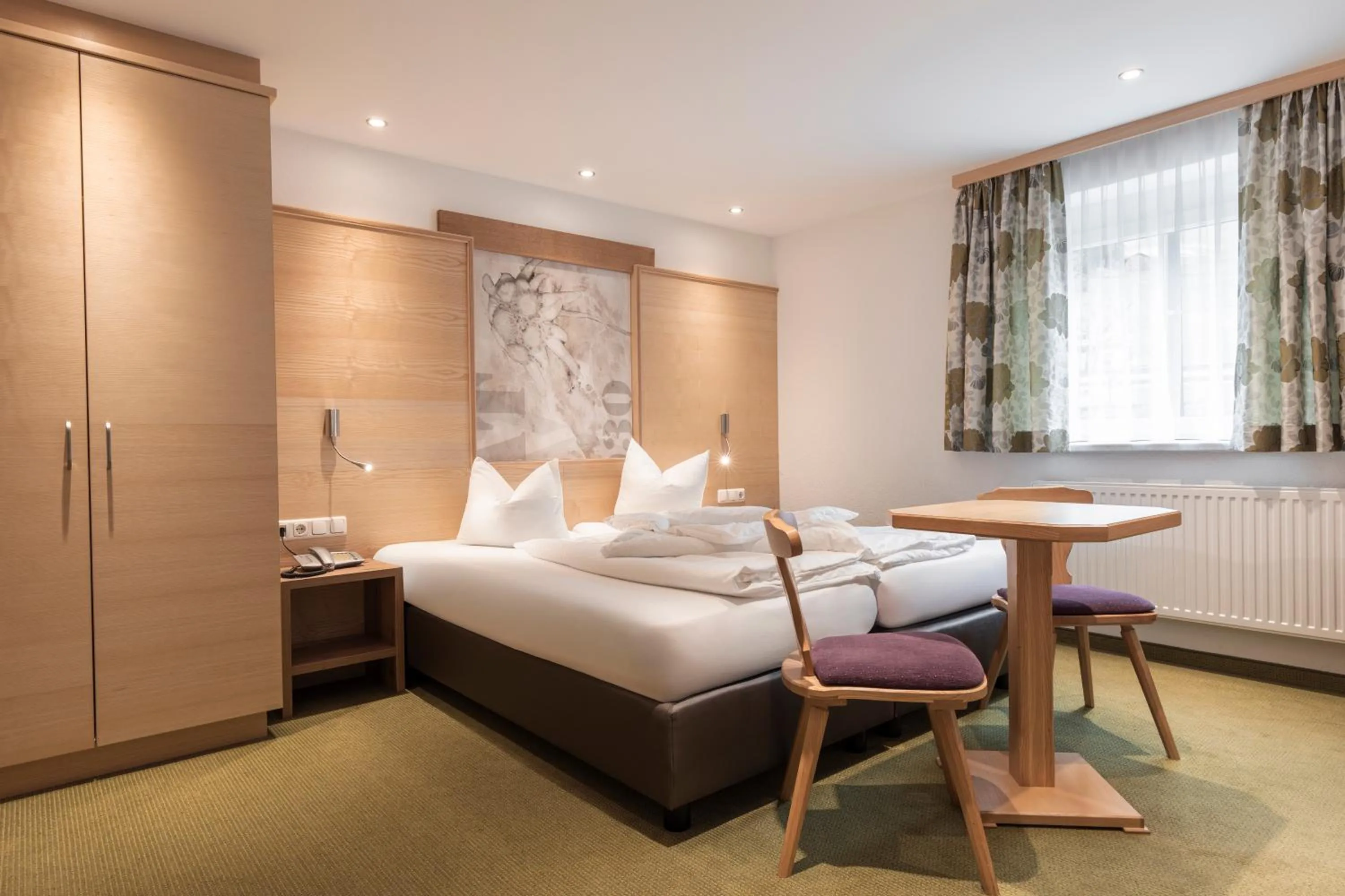 Bed in Hotel Garni Schmid