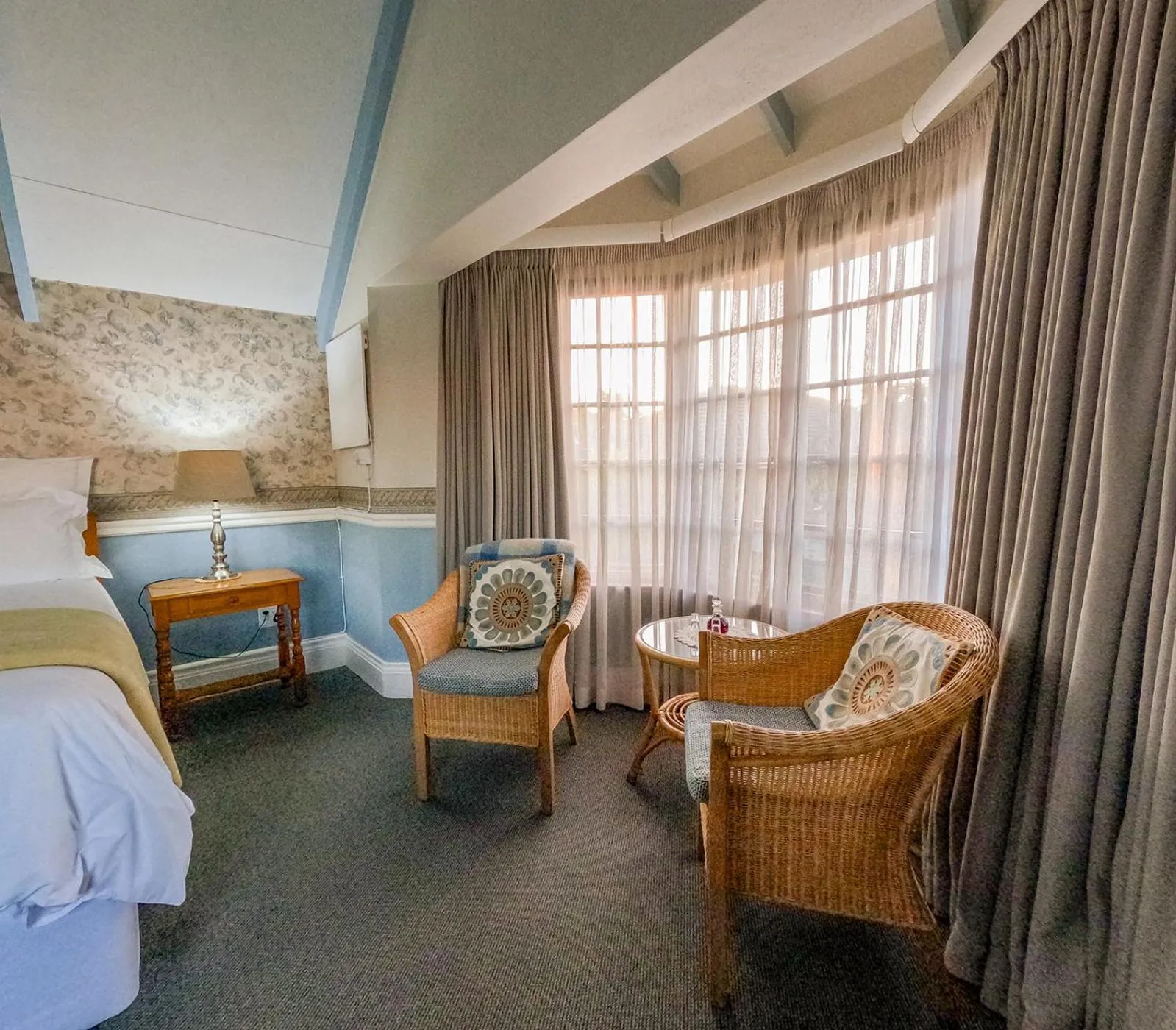 Seating area, Bed in Westlodge at Graskop B&B