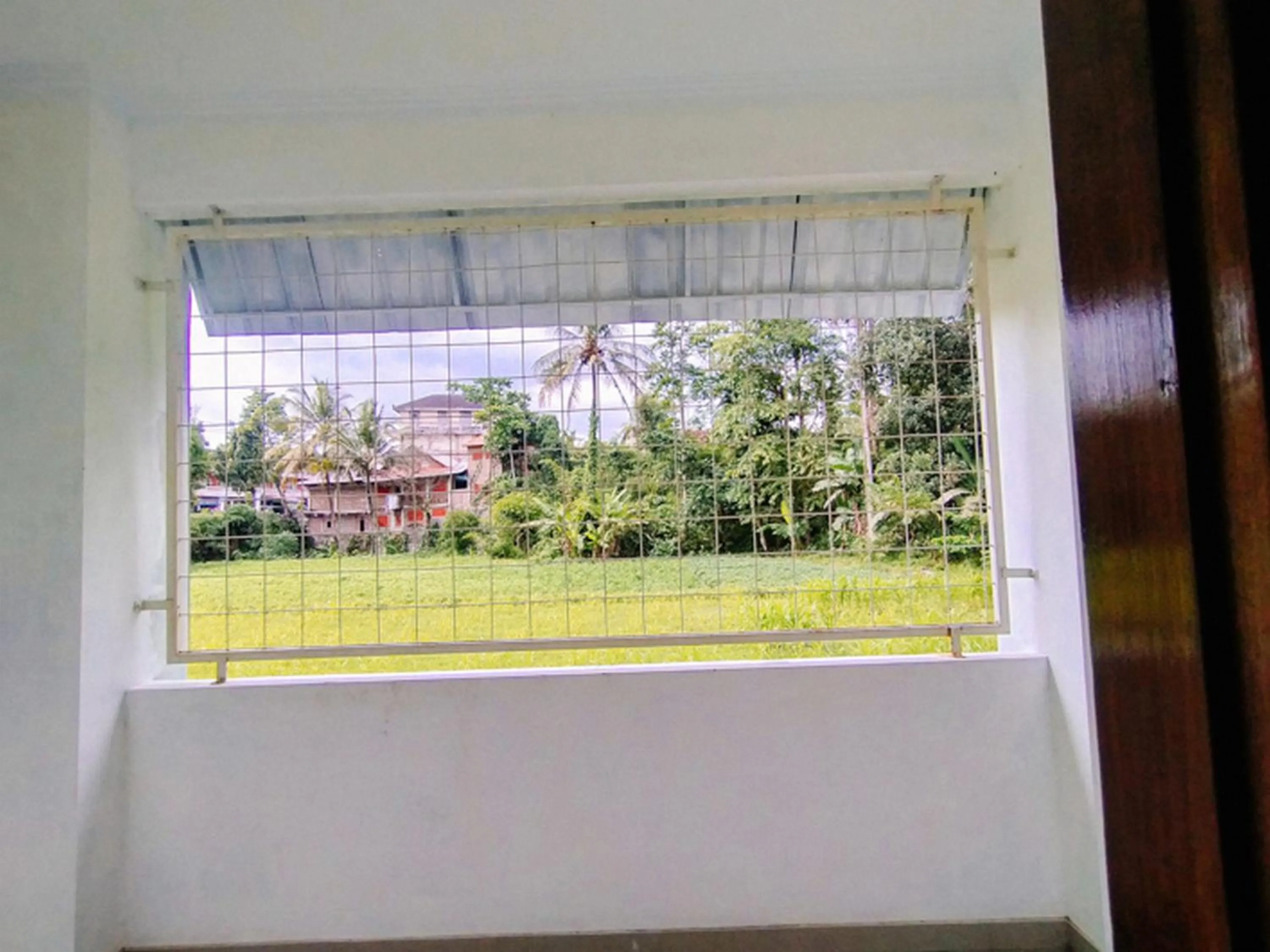 Property building in RedDoorz At Artomoro Guest House