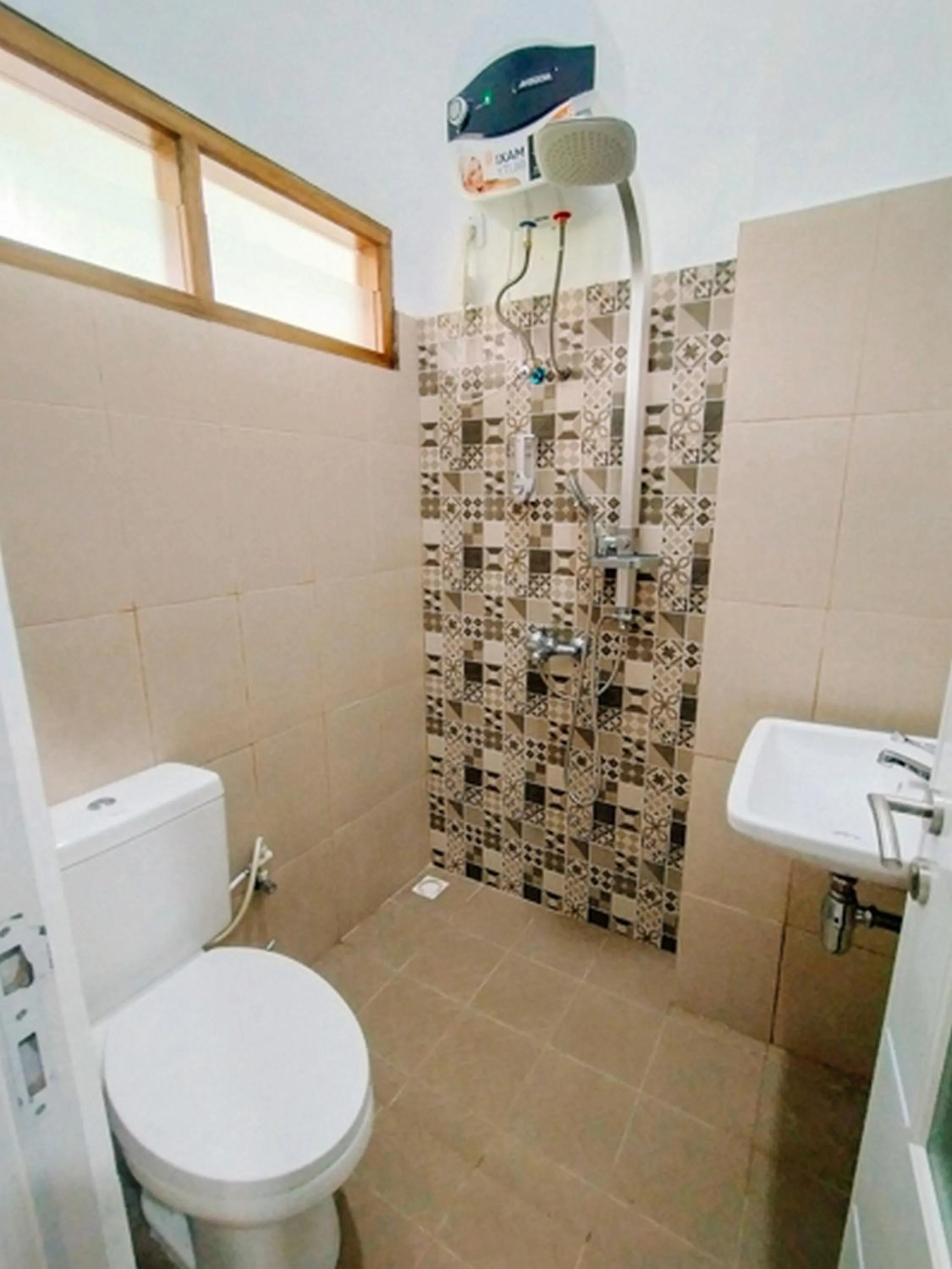 Property building in RedDoorz At Artomoro Guest House