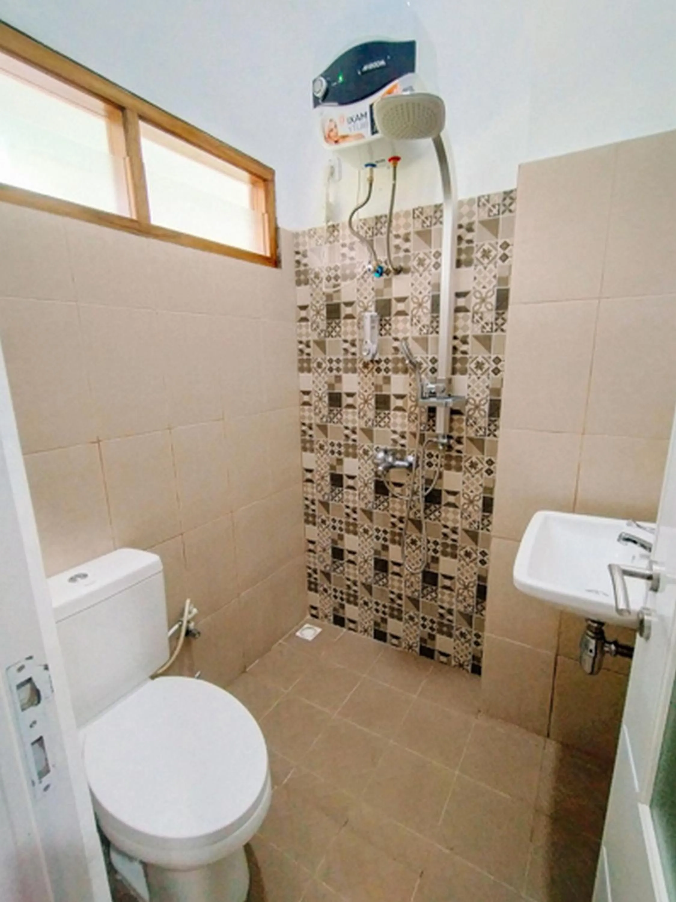 Property building in RedDoorz At Artomoro Guest House